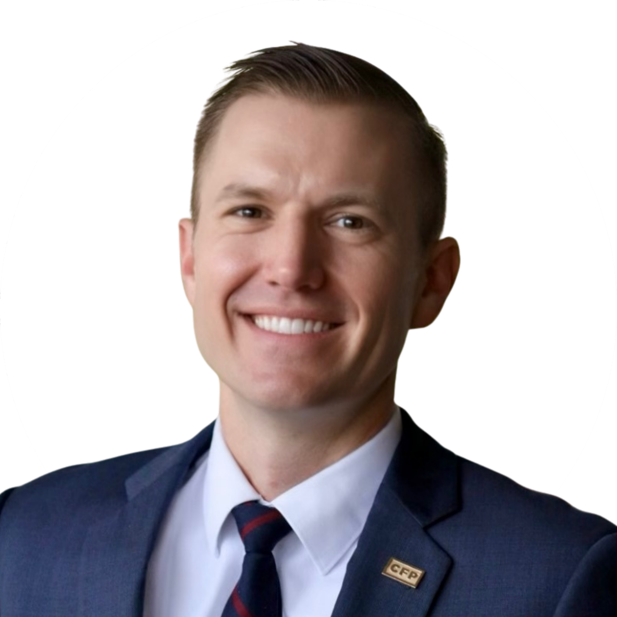 Portrait of a smiling man in a suit and tie, wearing a CFP pin on his blazer, against a white background.