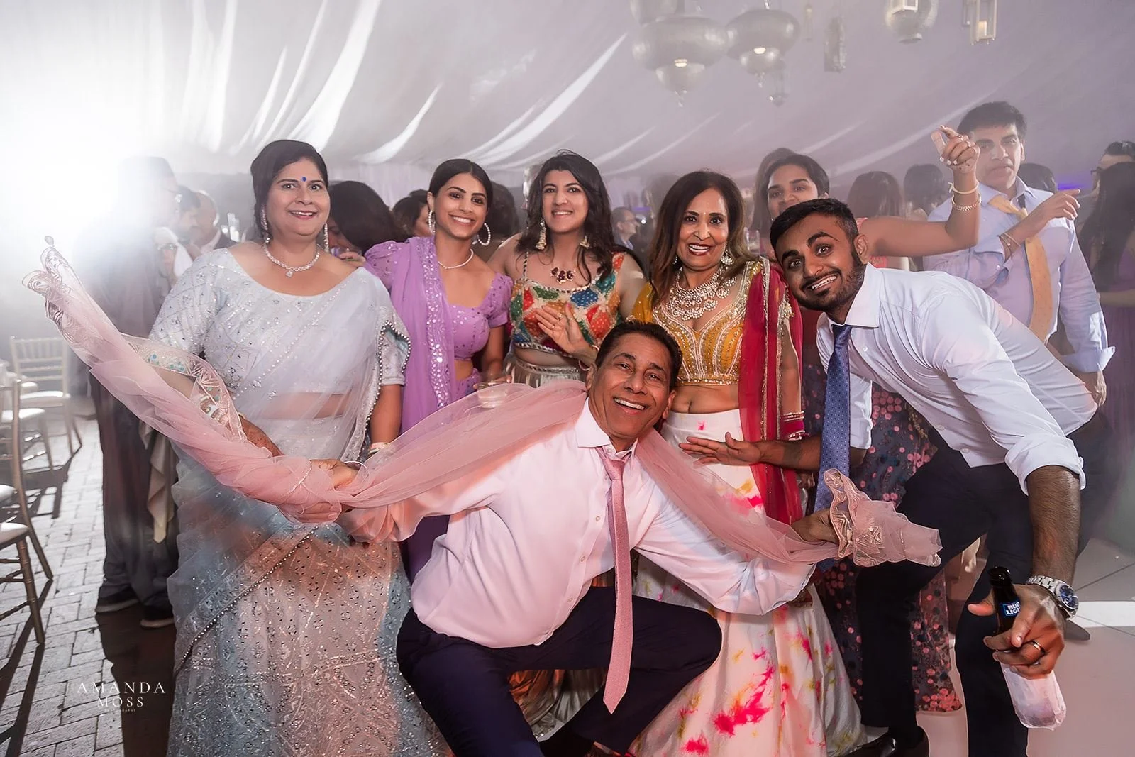 Guests celebrate at a hindu wedding reception at biltmore estate