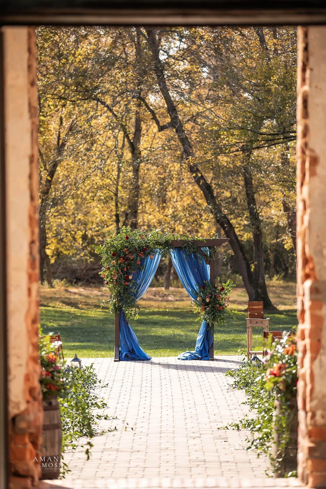 photo of ceremony set up for outdoor fall wedding at providence cotton mill