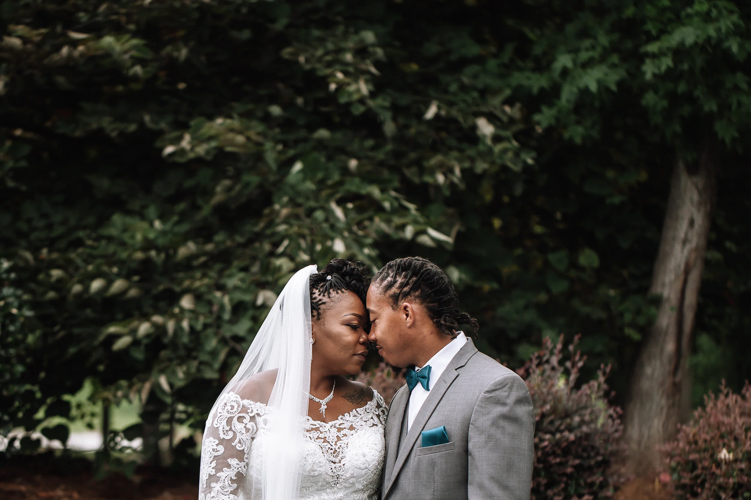 Black couple african american embracing after weddingn ceremony