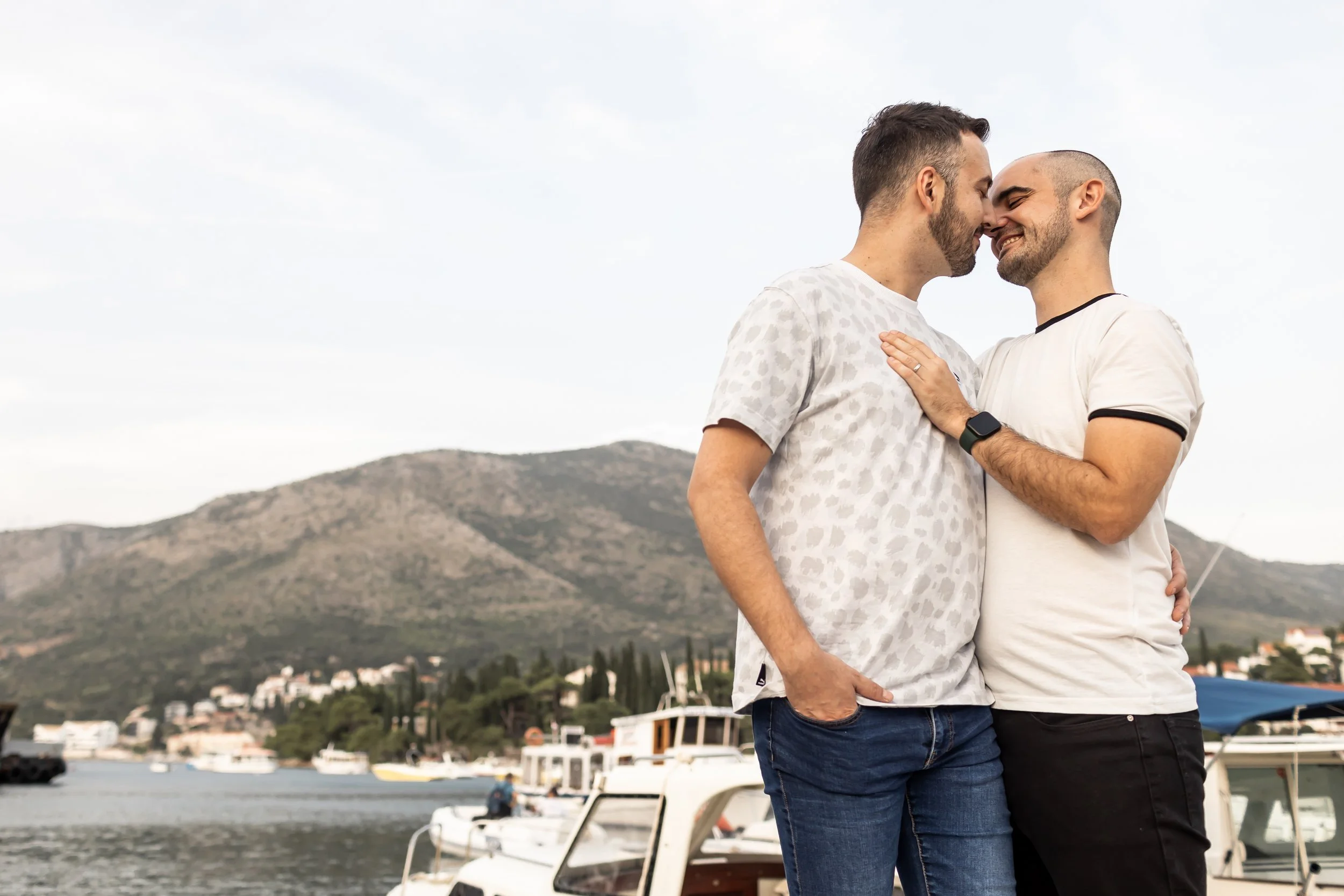 gay couple embraces for photos in croatia