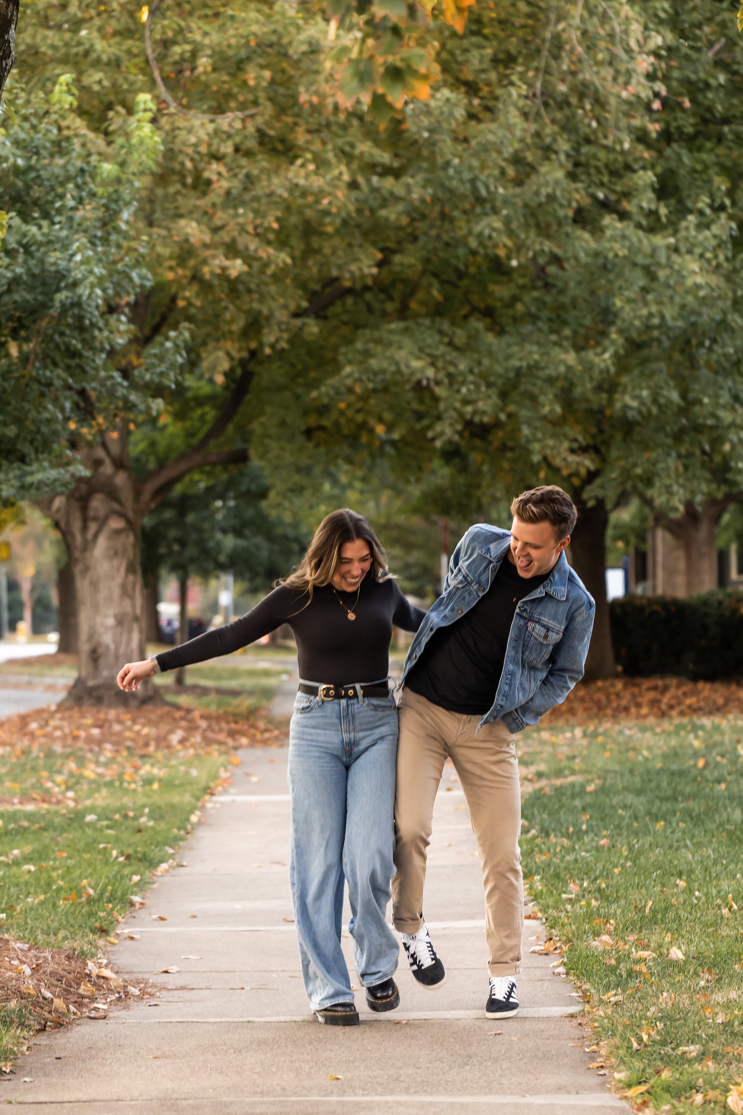 playful couple celebrates being newly engaged charlotte nc dilworth neighborhood