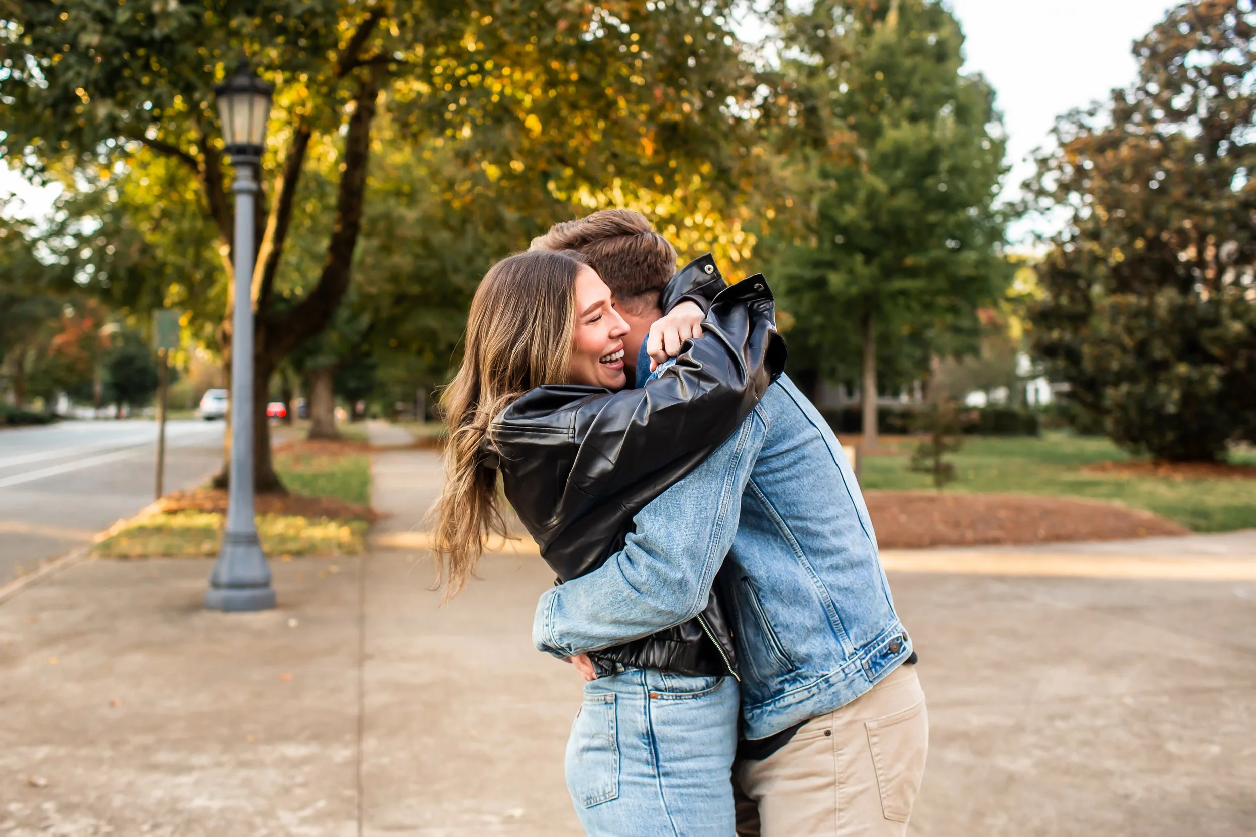 hug and embrace couple engaged proposal charlotte nc photographer
