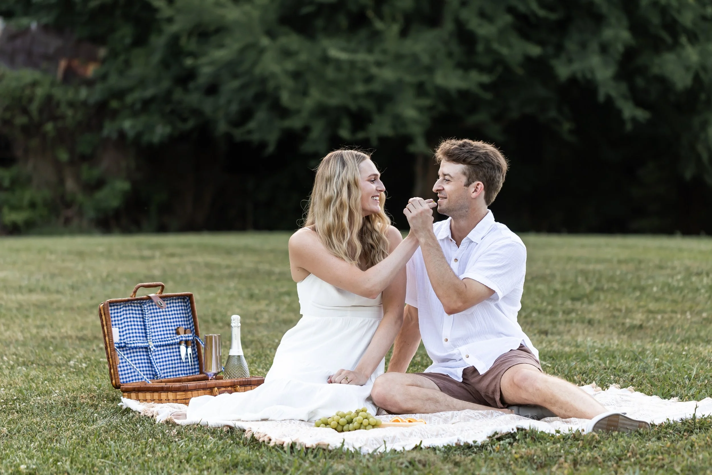 engagement session in the park picnic golden hour white dress charlotte nc photographer