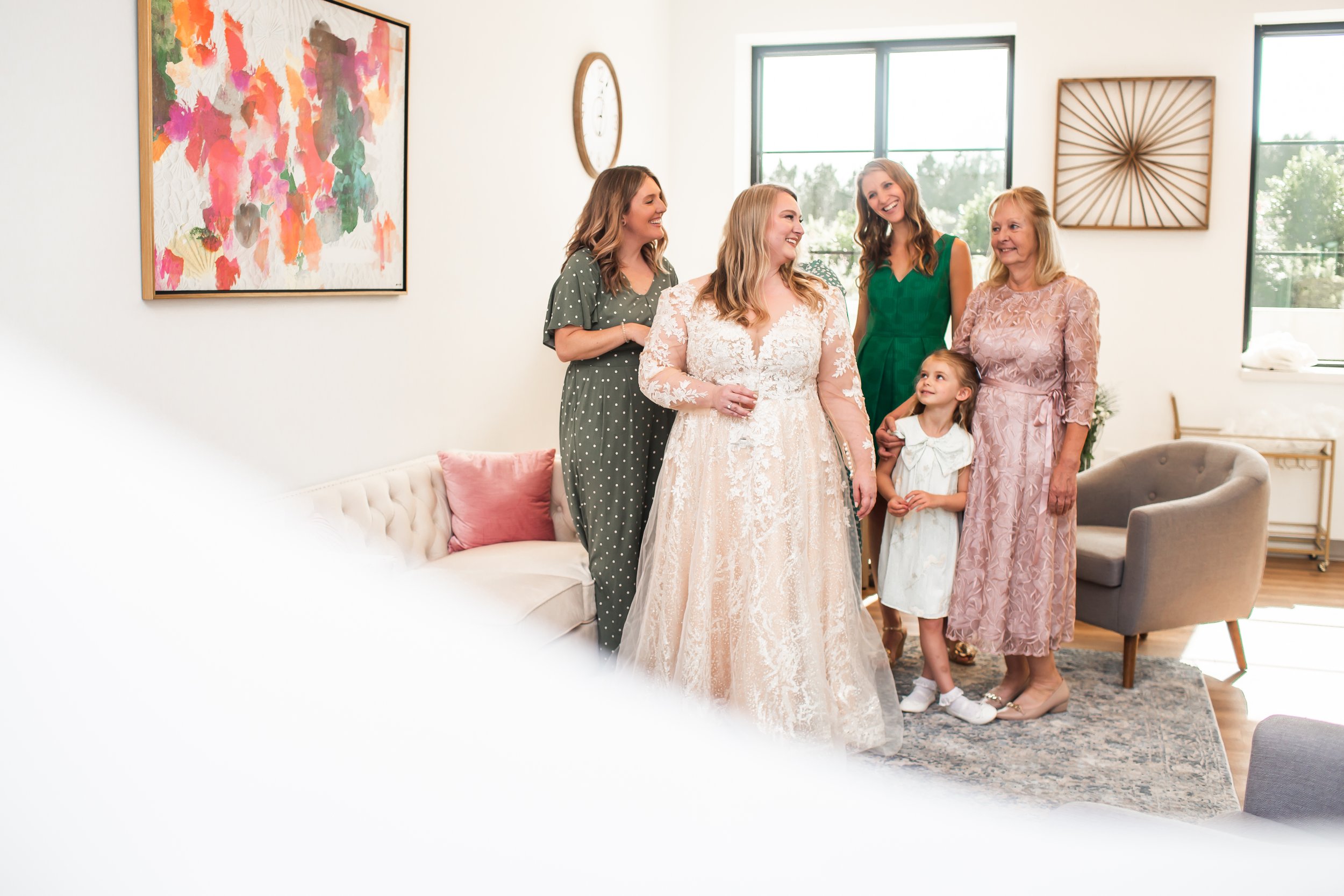 bride relaxing with family and friends before ceremony veronet vineyards