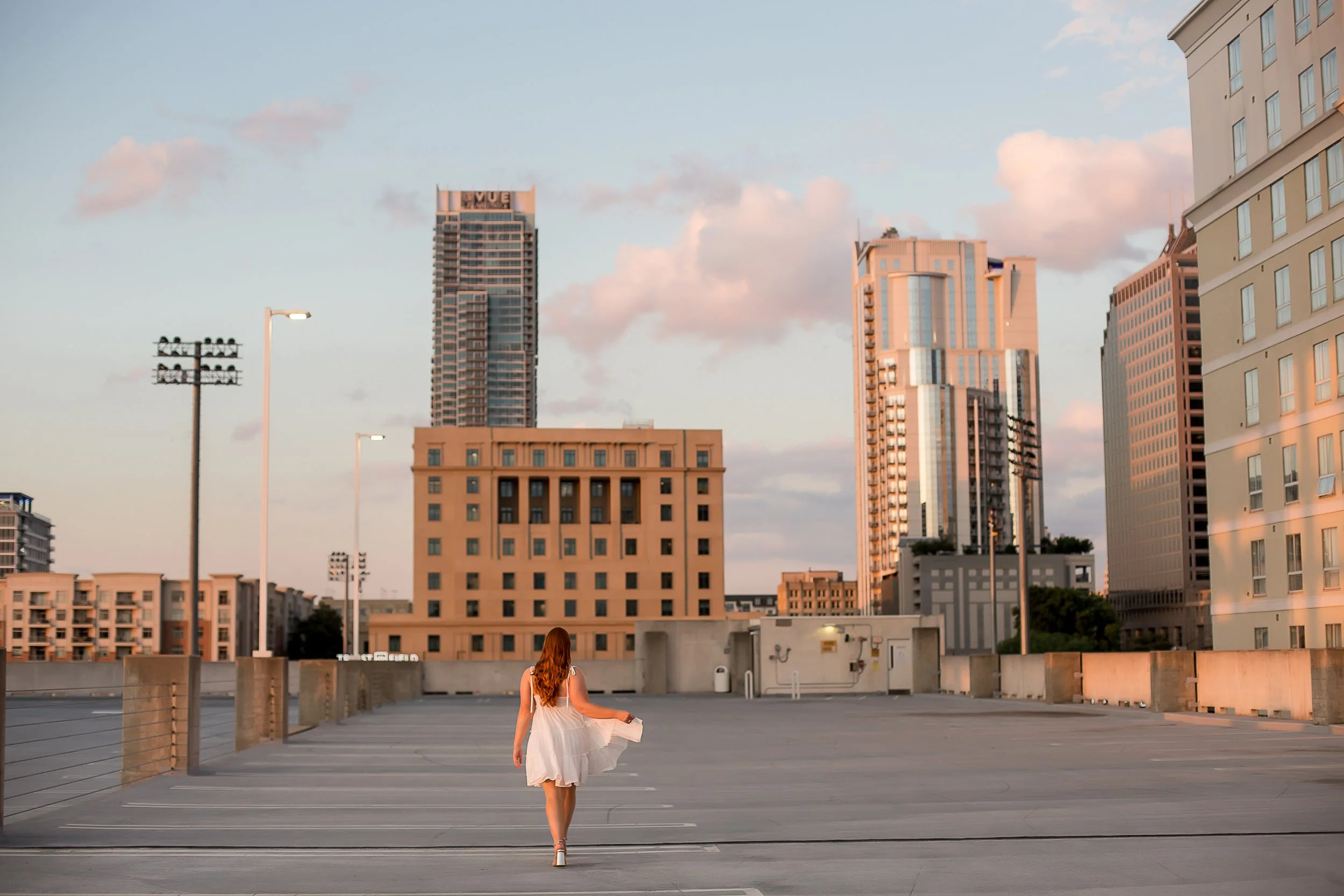 charlotte nc downtown rooftop high school senior photo girl in white dress