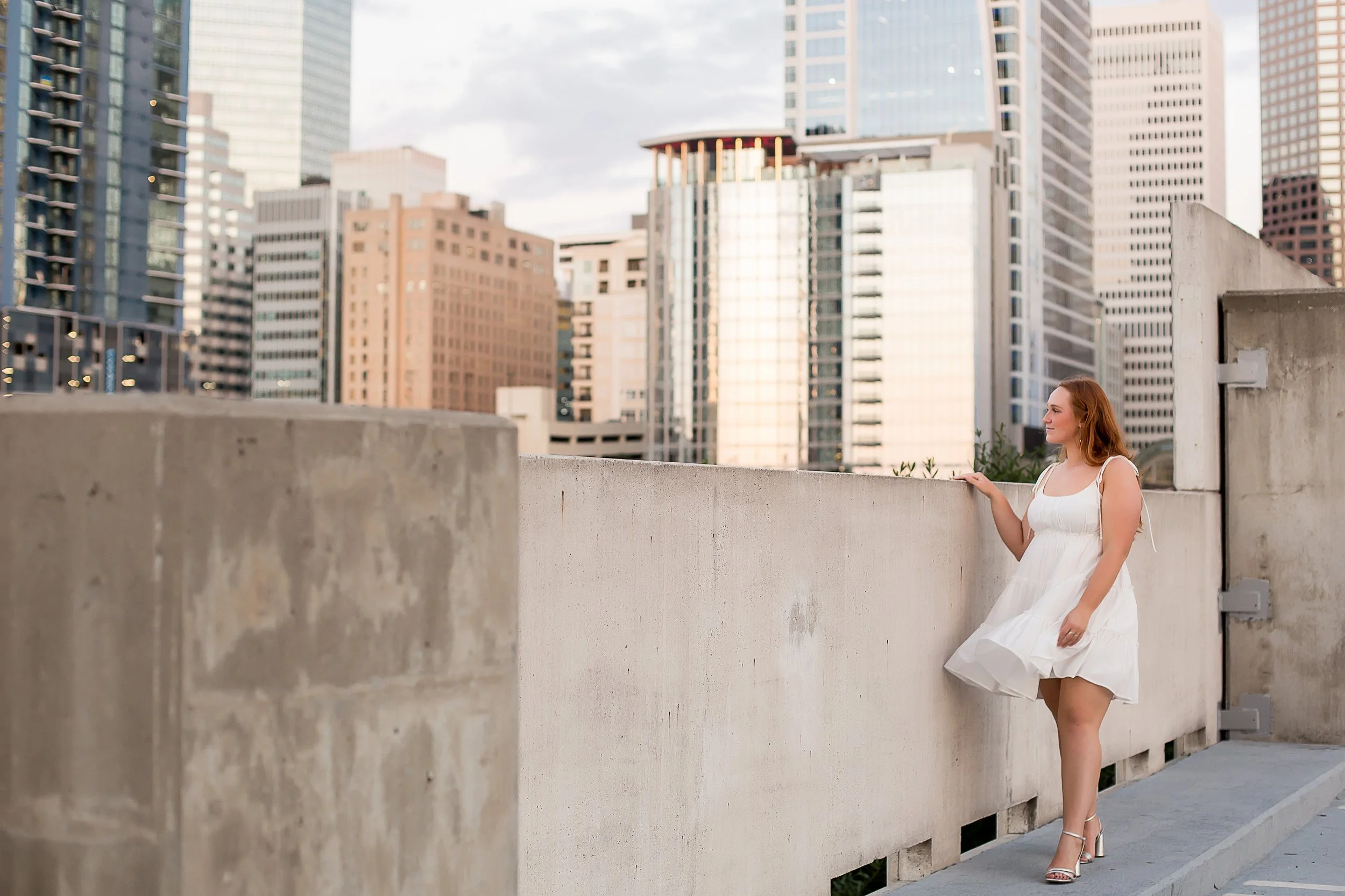 senior photo shoot downtown charlotte nc rooftop sunset