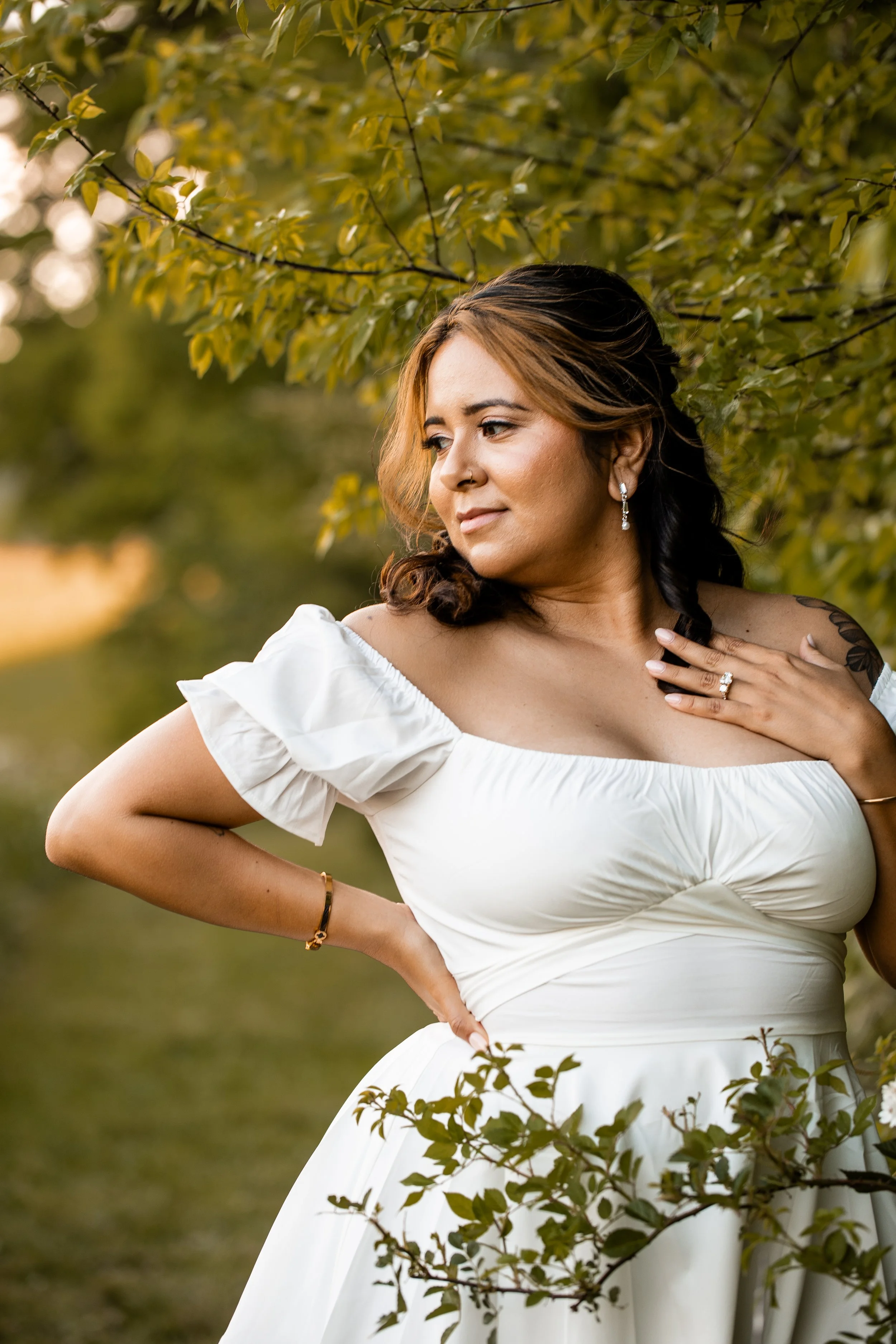 Romantic close-up portrait of Vanessa and Alex surrounded by greenery and wildflowers at Clark's Creek Nature Preserve