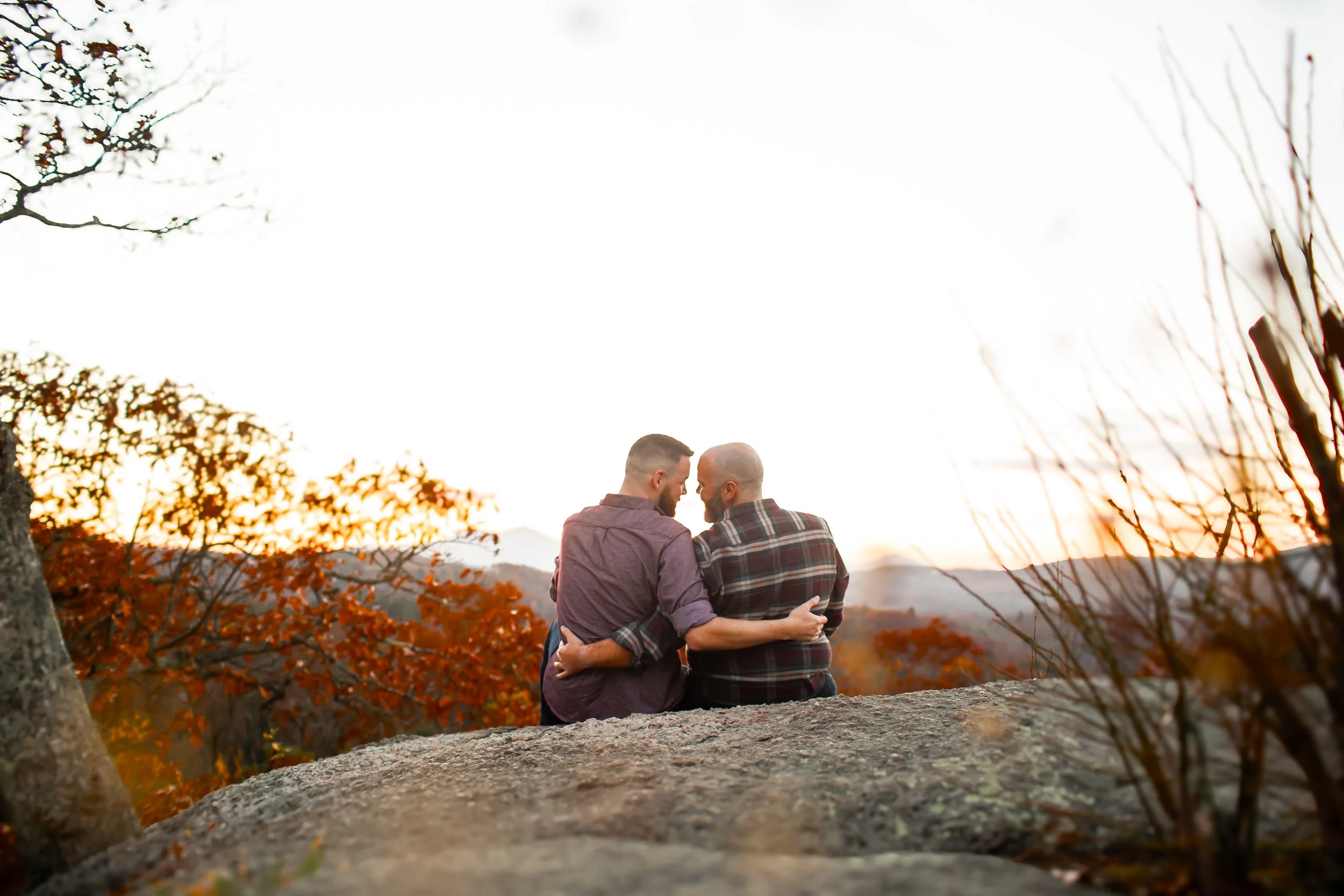 lgbt couple overlooking nc mountains in the fall asheville elopement photographer