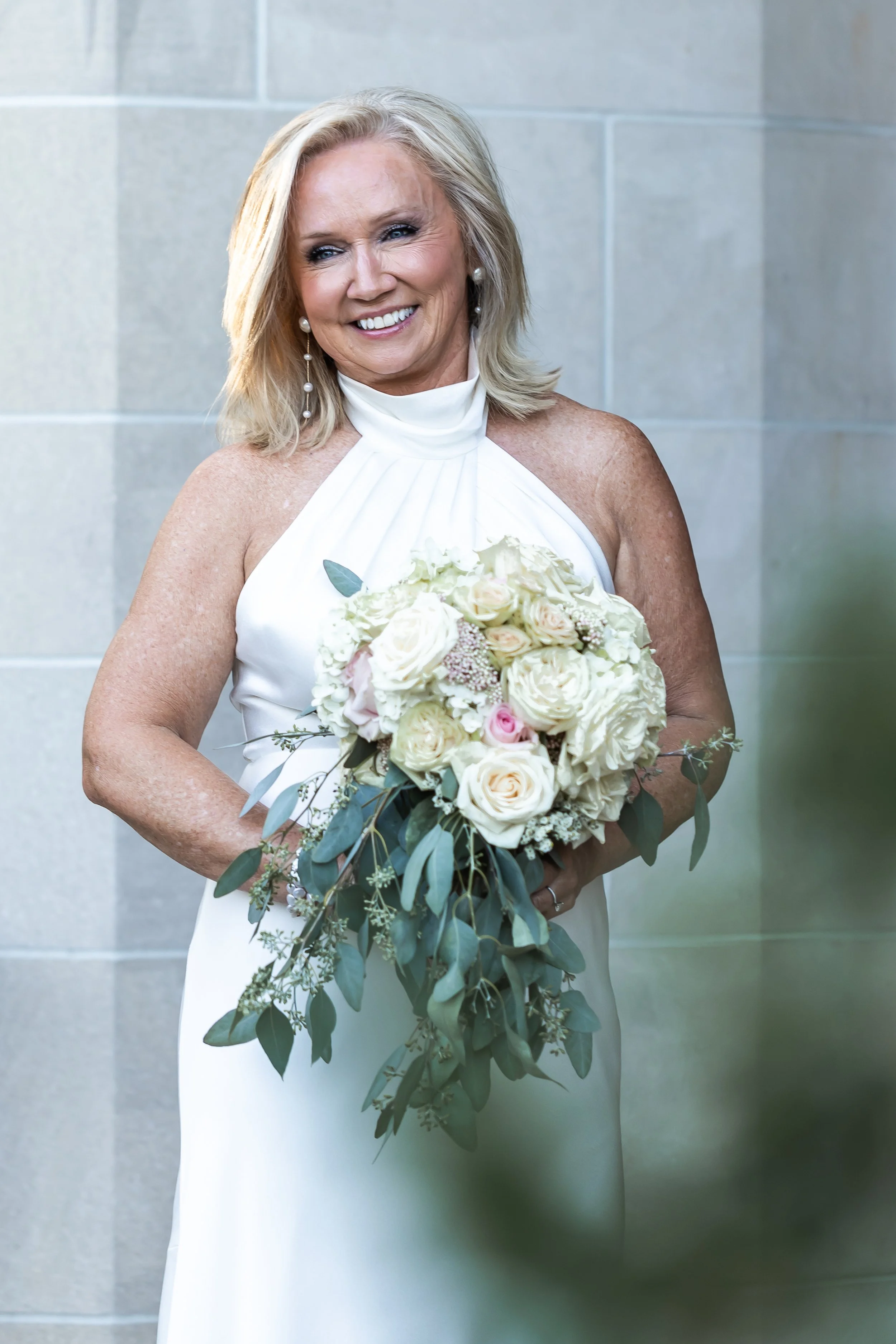 gorgeous mature bride holding sophisticated bouquet charlotte nc second wedding