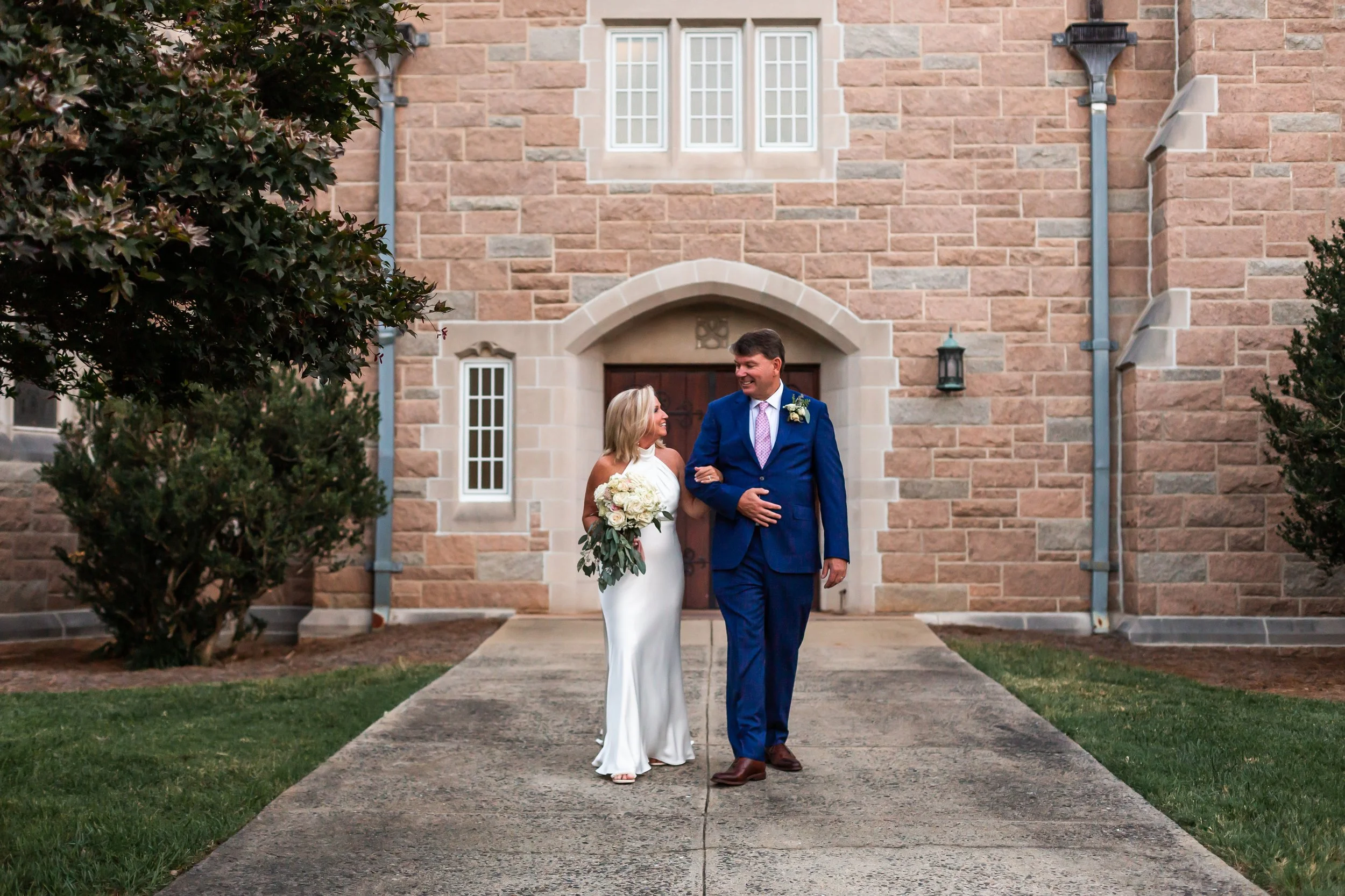 small wedding bride and groom older couple photography satin dress navy suit