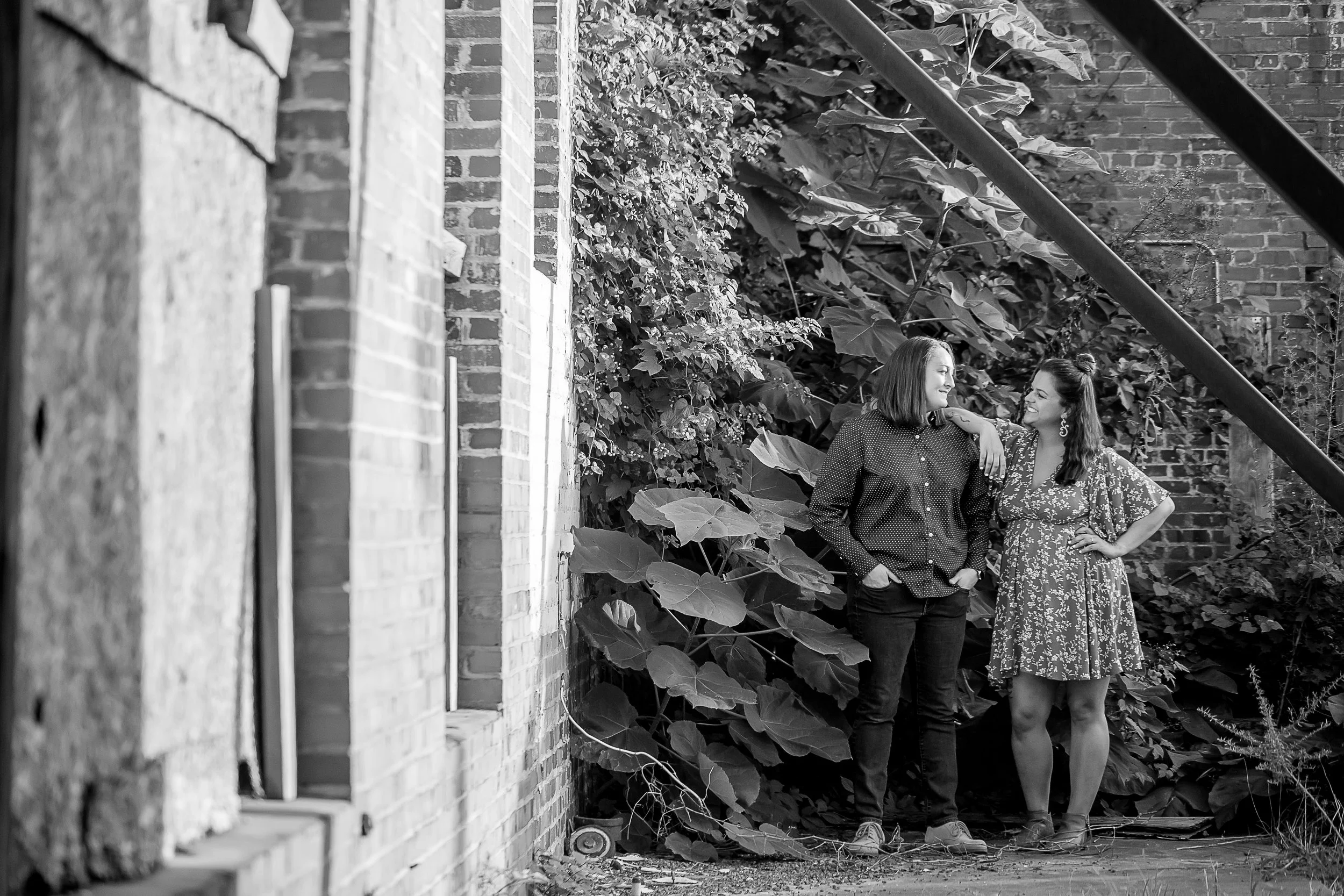 black and white image of lgbt lesbian couple in southend charlotte north carolina abandoned urban area
