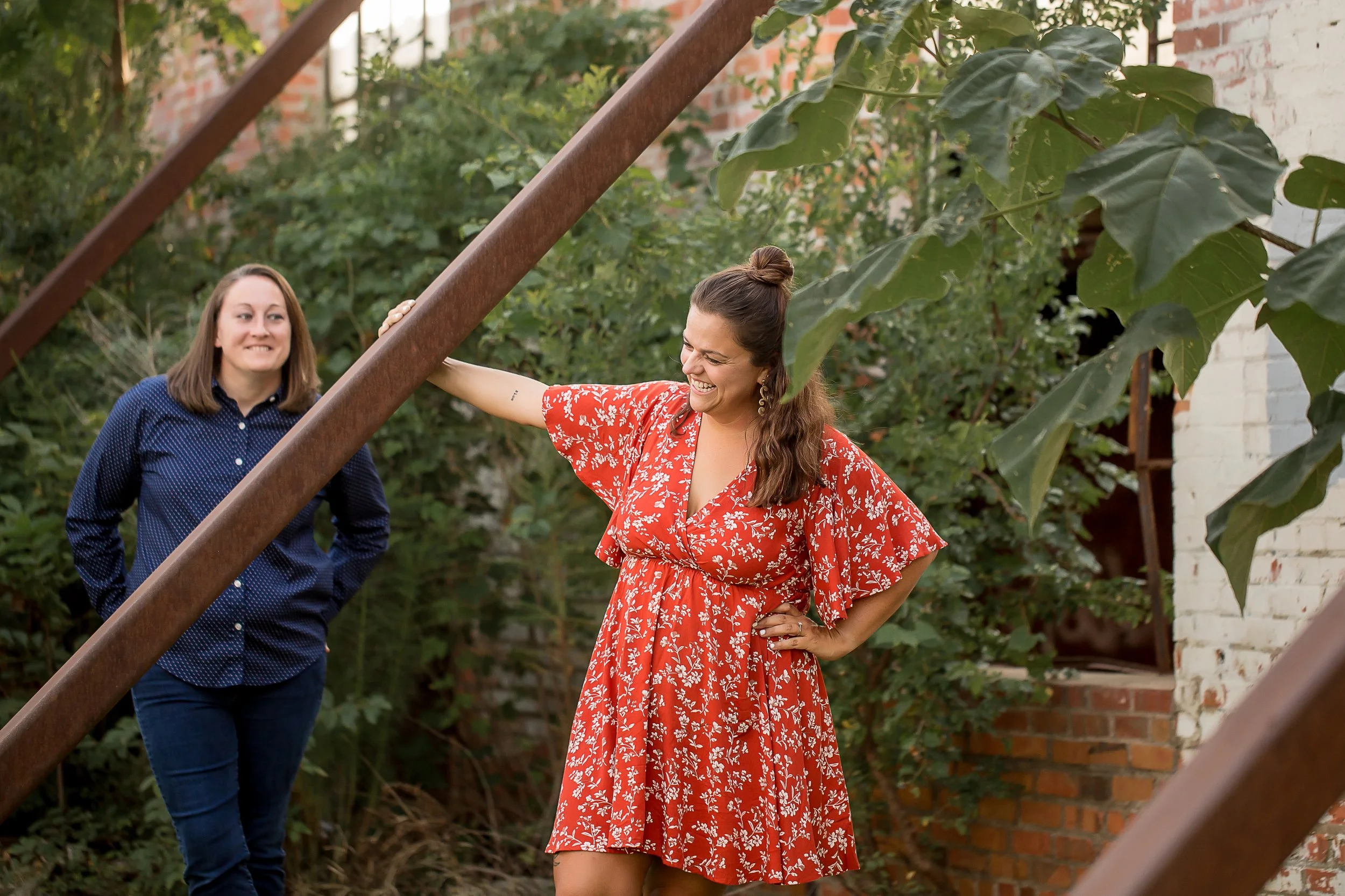 cute photo of woman laughing during lgbt engagement photo shoot southend charlotte nc