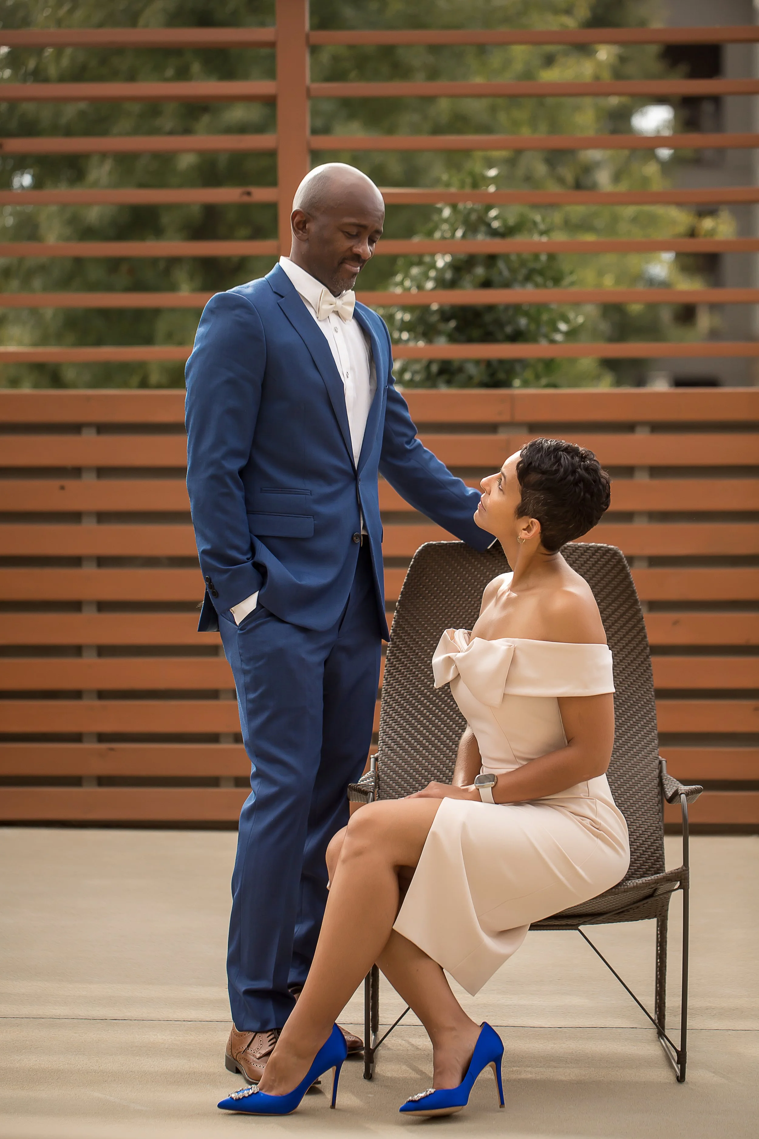 african american couple stylish hotel courtyard