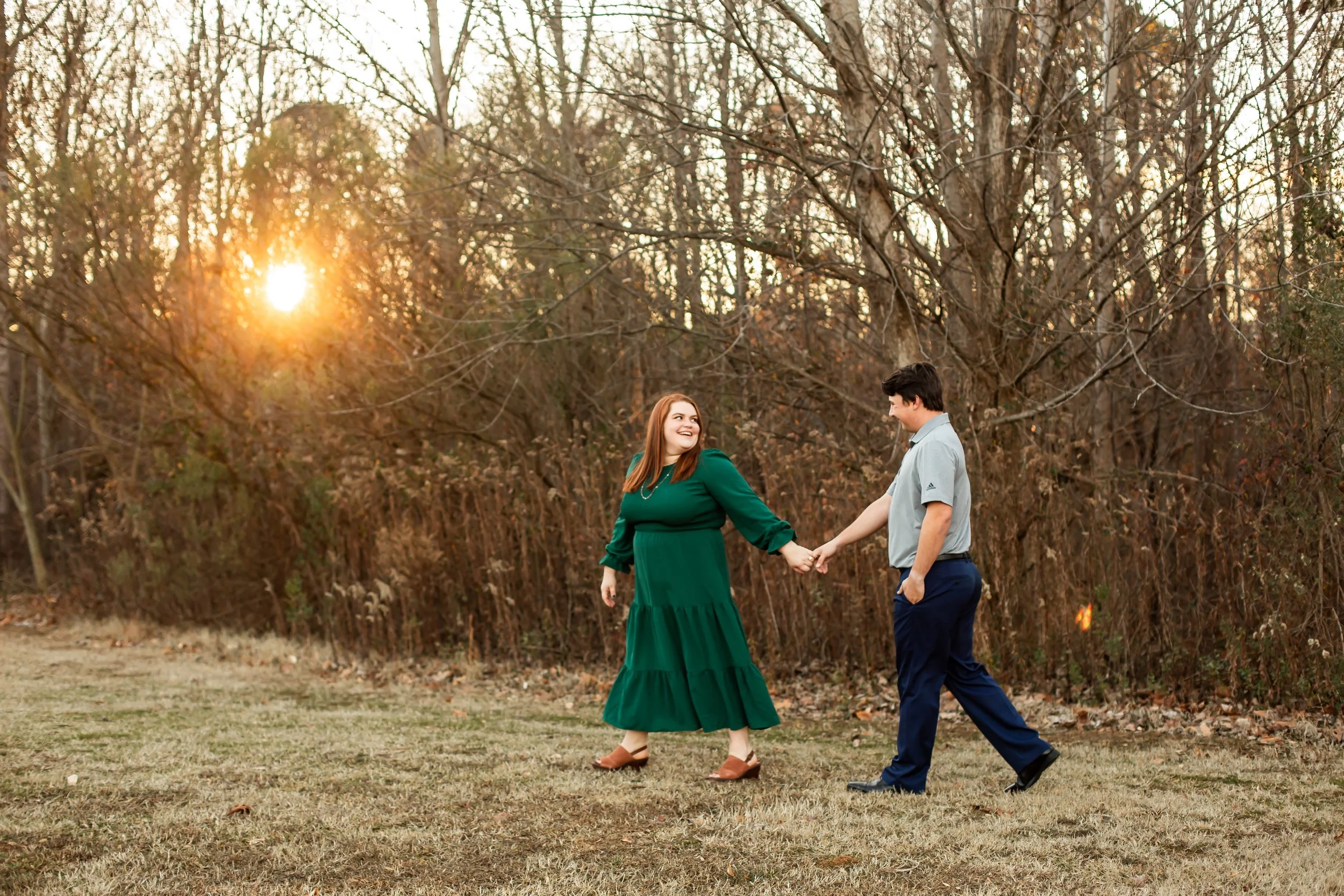 flowy dress engagement session deep green warm golden sun