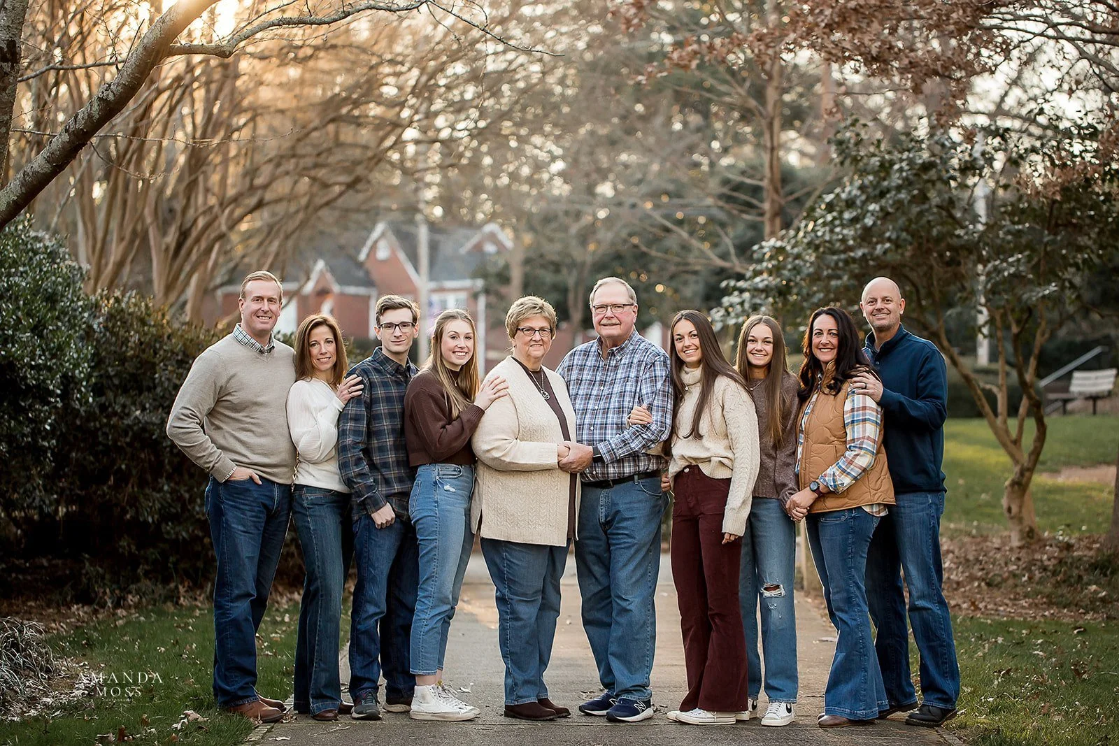 extended family fall portrait of grandparents and their kids and grandkids