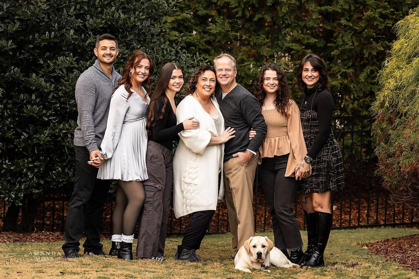adult family photo with dog at charlotte nc home