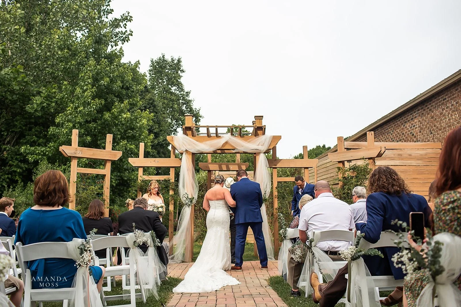 outdoor wedding ceremony at magnolia woods wedding venue in huntersville nc