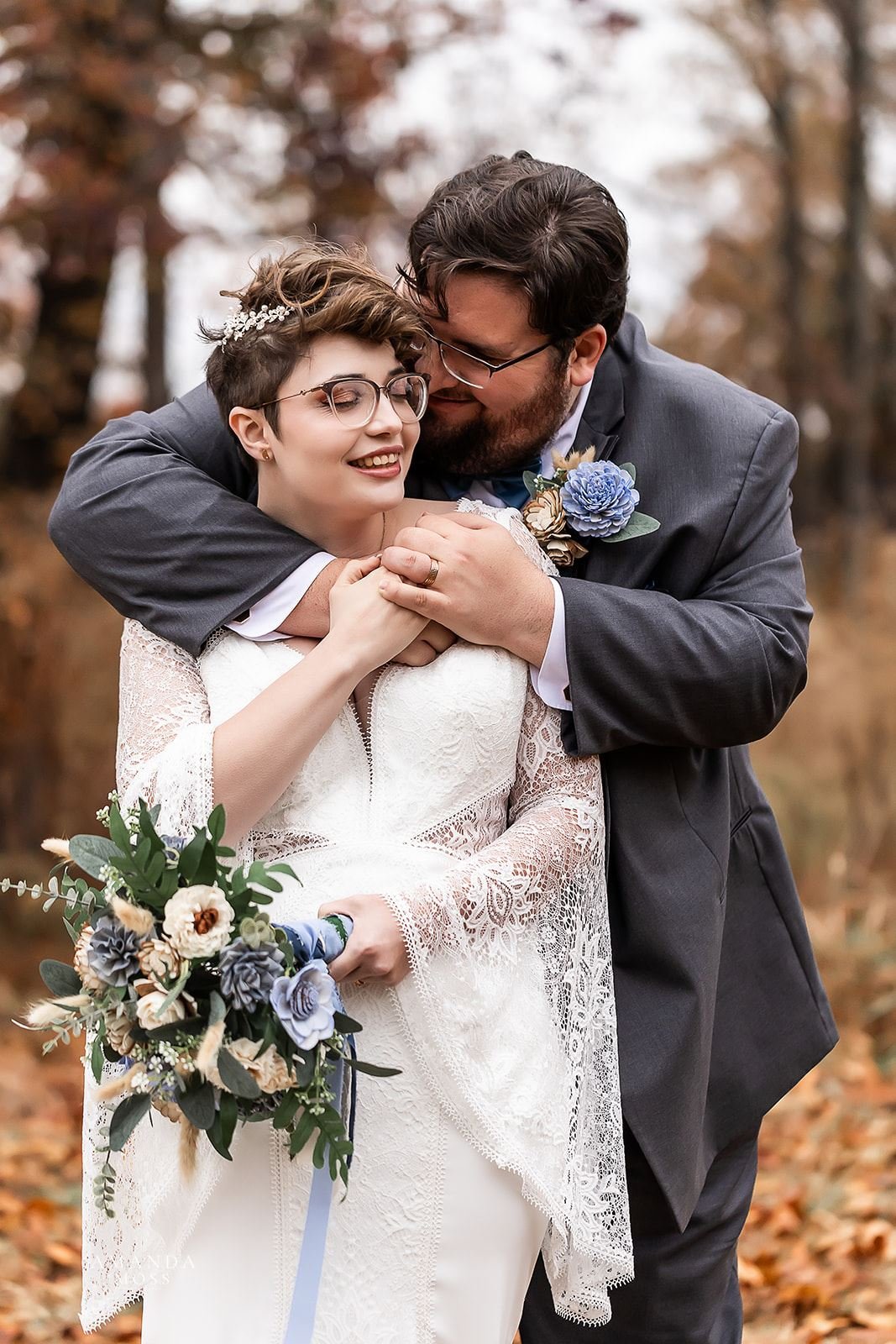 bride and groom embrace at fall wedding at bansen farms north carolina