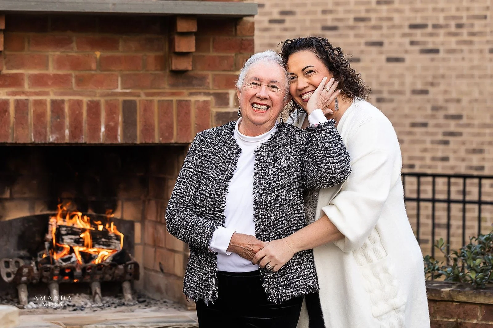 mother hugs her adult daughter in family photo shoot charlotte nc