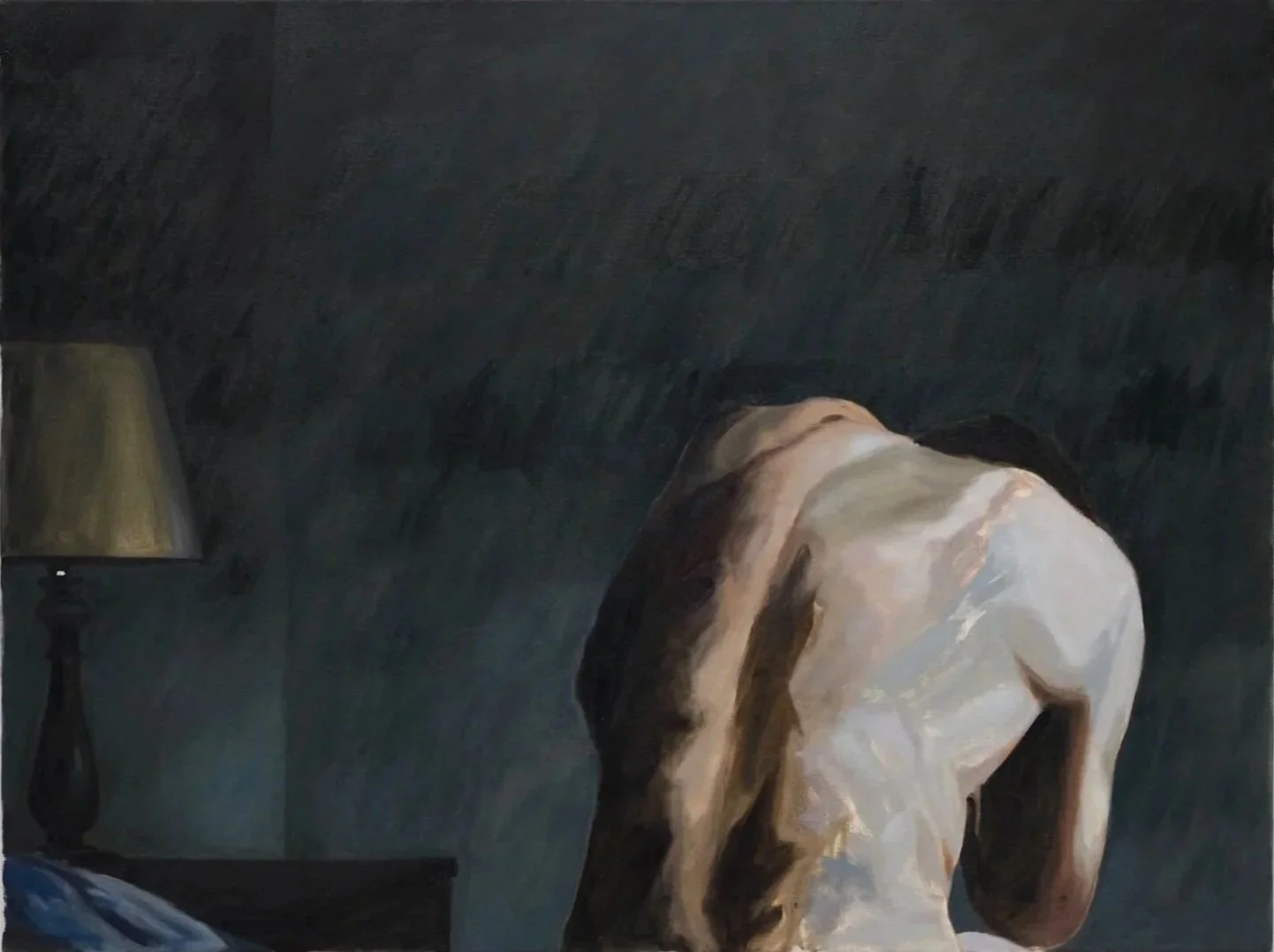 A painting of a person sitting on the floor with their head resting on their arms, viewed from behind. The person has dark hair and is wearing a light-colored shirt. The background is dark with a lamp and some furniture visible.