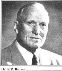 Black and white portrait of Dr. R.R. Brown in a suit and tie.