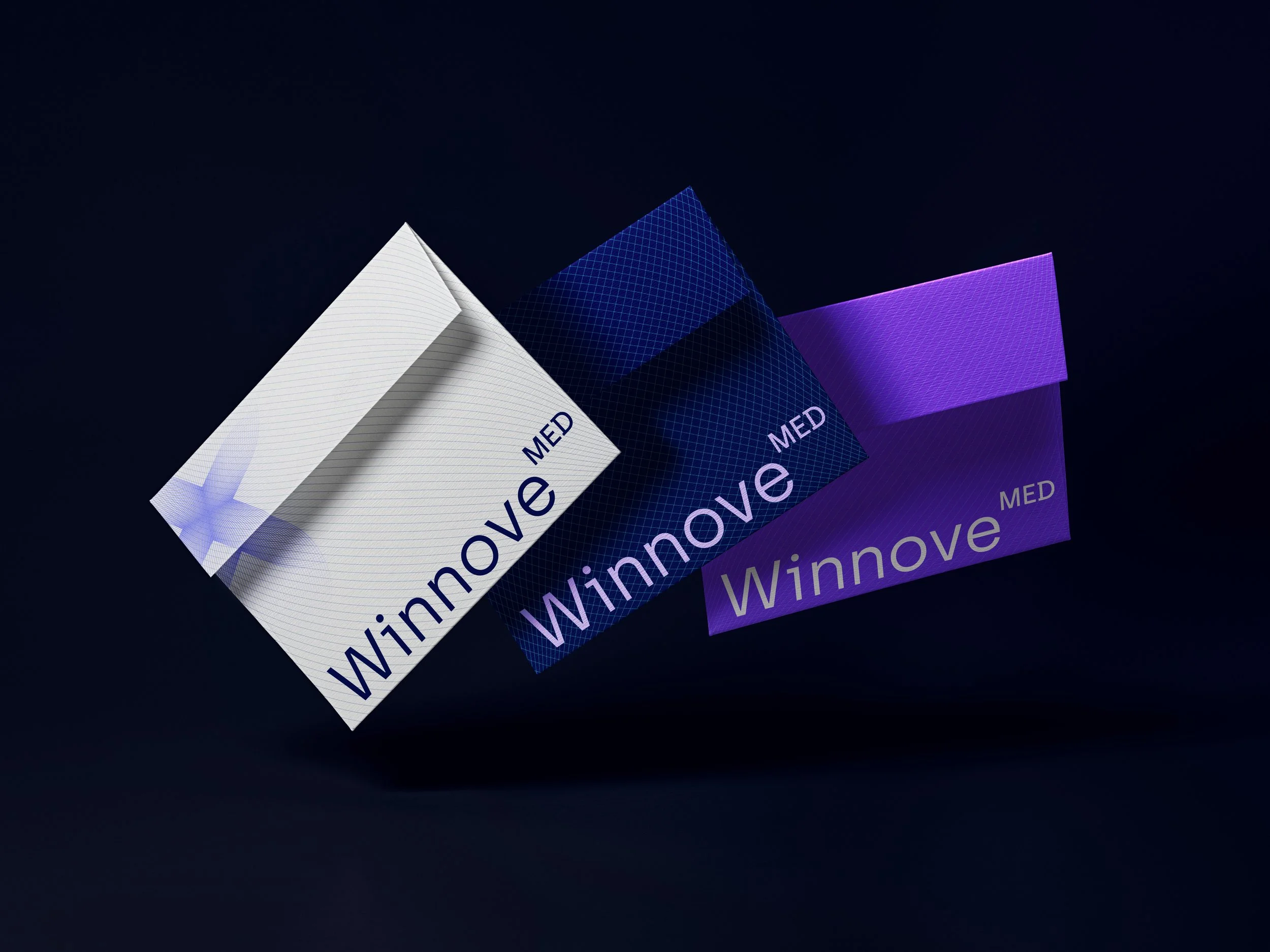 Close-up of three overlapping rectangular cards with the words "innovate" and "Winne" visible on each, in white, blue, and purple colors, against a dark background.