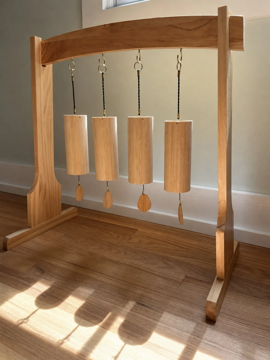 Wooden chimes in the Grace and Wonder massage studio.