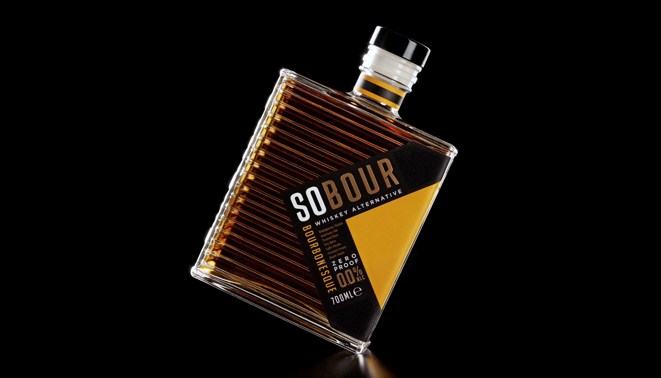 A bottle of SOBOUR whiskey alternative with a black background.
