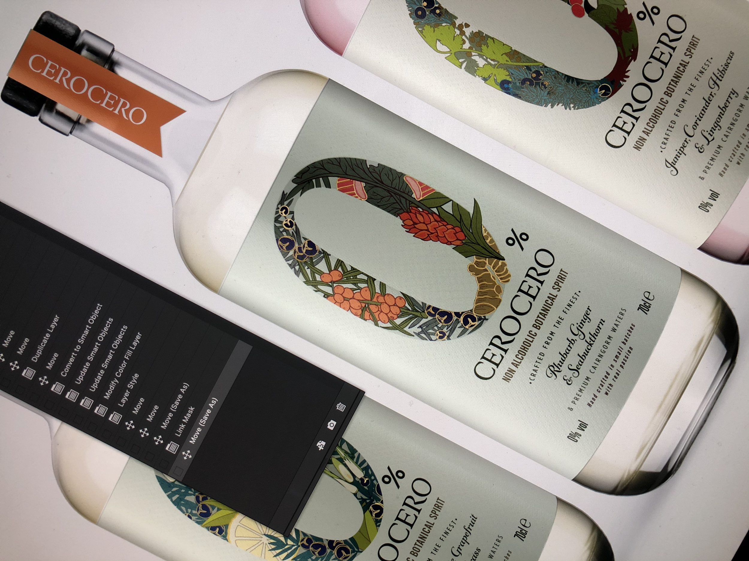 Close-up view of product packaging for Cerocero herbal supplement, featuring a decorative circular design with plant illustrations on the label, and a black and orange dosage dropper.
