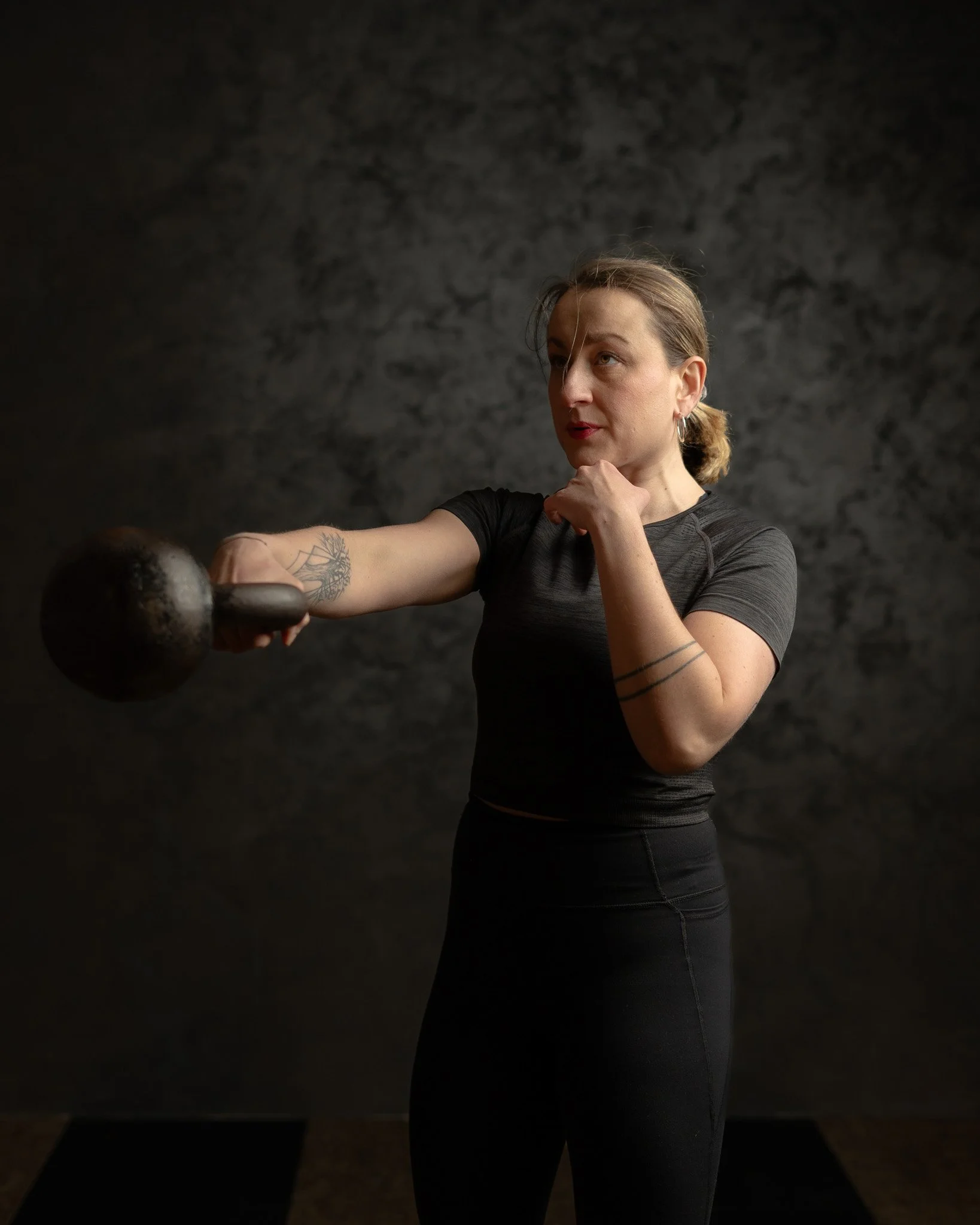 Marina Tkalčić, StrongFirst Elite Instructor and founder of Strength Studio Marina, performing kettlebell swing.