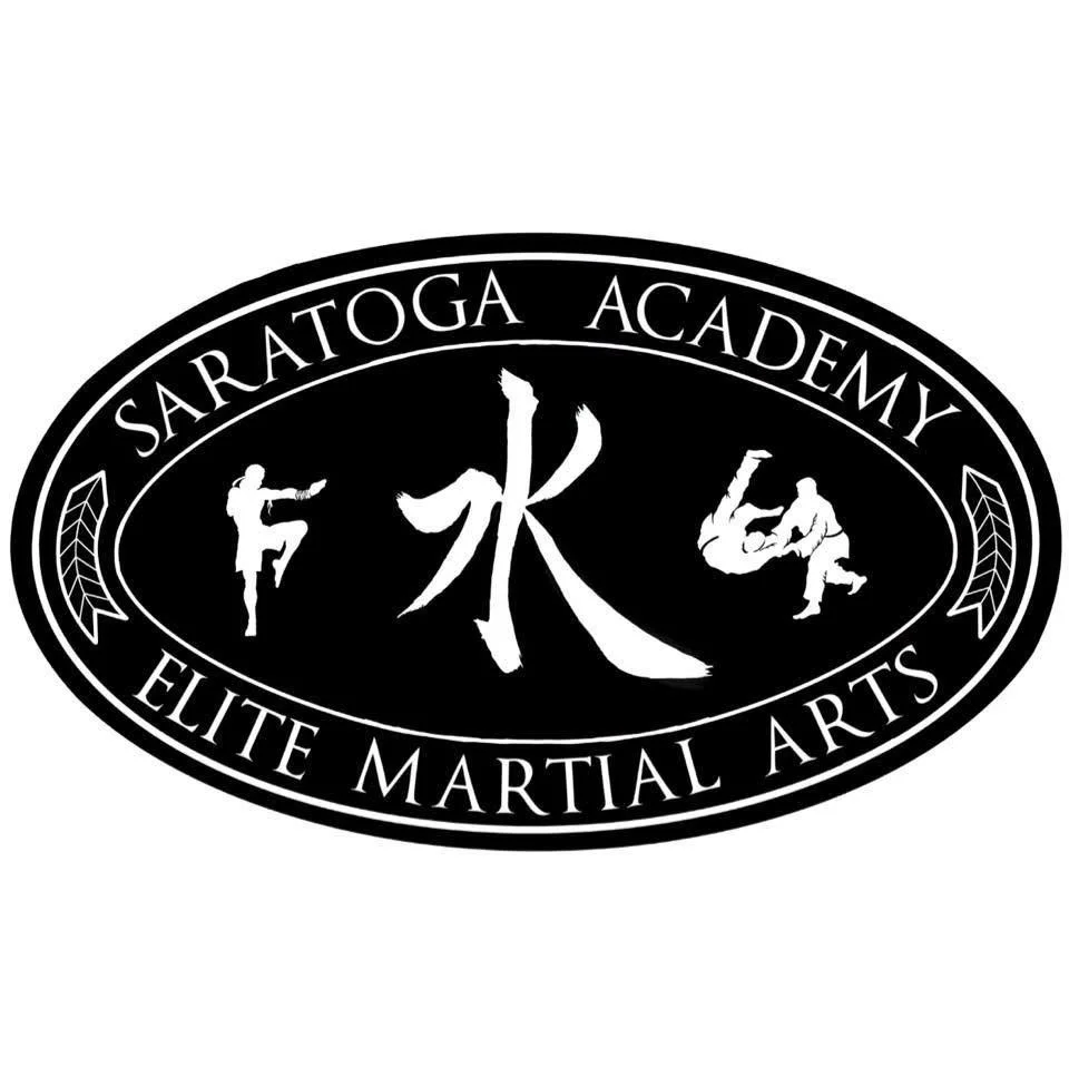 Logo for Saratoga Academy Elite Martial Arts featuring text and martial arts figures in a black and white oval design.