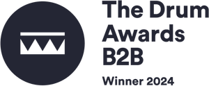 Logo for The Drum Awards B2B 2024 featuring a circular icon with zigzag lines and text indicating the award event and year.