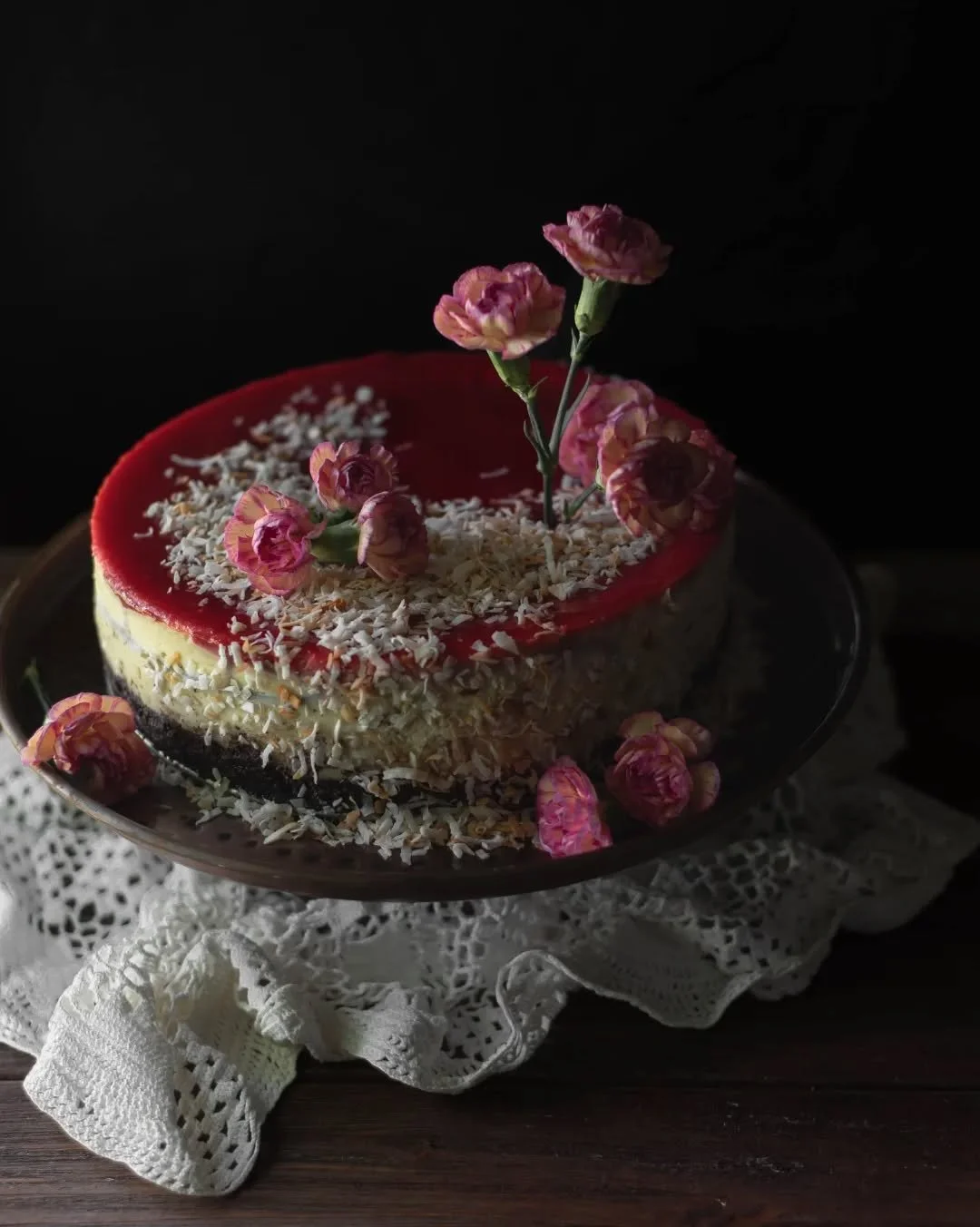Well, hello there. 
Springtime in Rhode Island for three New Yorkers now includes my dearest mom. 
This coconut cheesecake with chocolate crust and raspberry layer wouldn't be possible without the many times I'd lie awake in bed, hearing her bake int