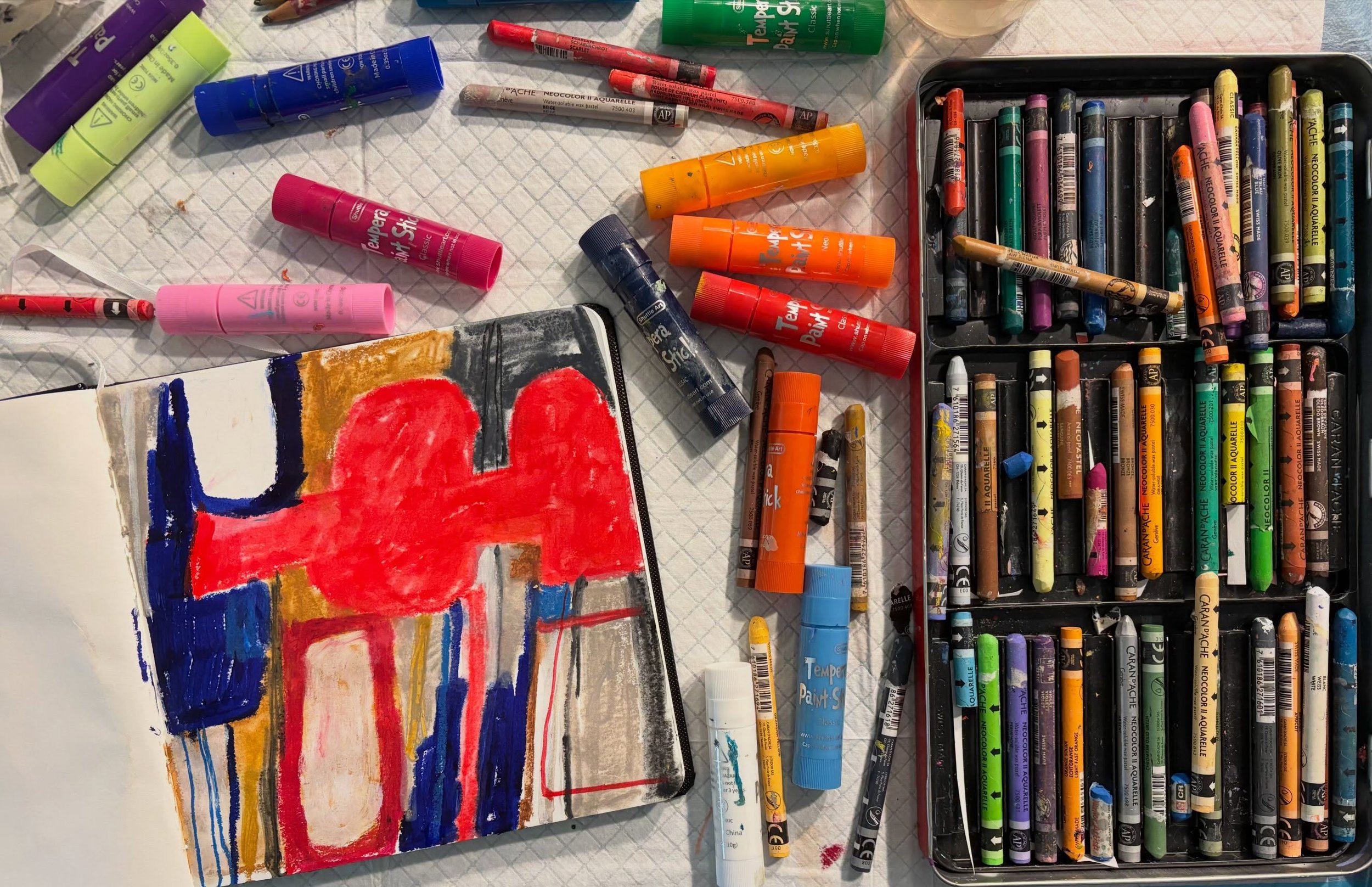 Collage as inspiration. The red squiggly shape  is a fav of mine, so working in a journal today with minimal supplies. Caran D&rsquo; Ache Neocolor II , tempera sticks and a random piece of blue Neopastel that was in my crayon box.

Collage artist, A