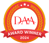 DAA Award Winner 2024 badge with laurel wreath and ribbon.