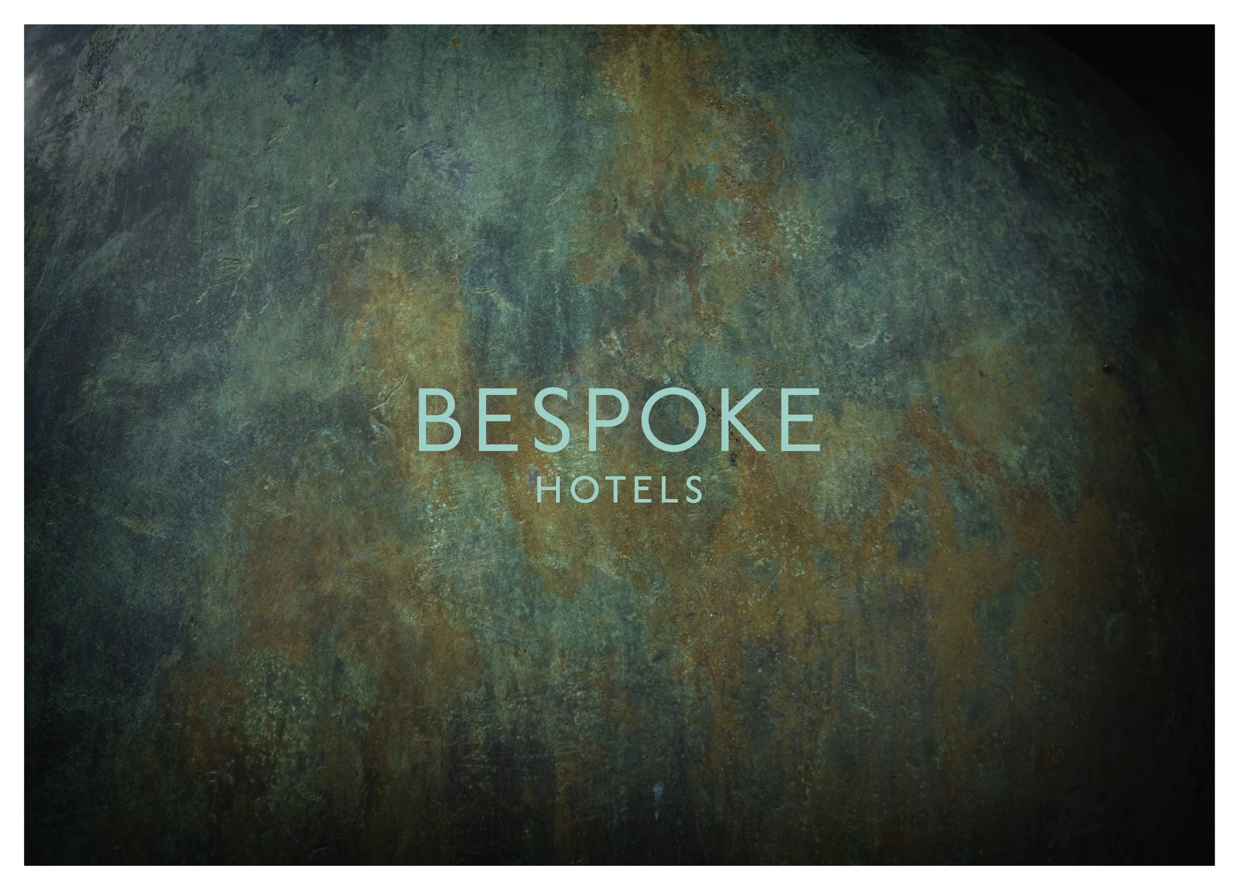 Rusty green metallic surface with the bold, large text 'BESPOKE HOTELS' overlaid.