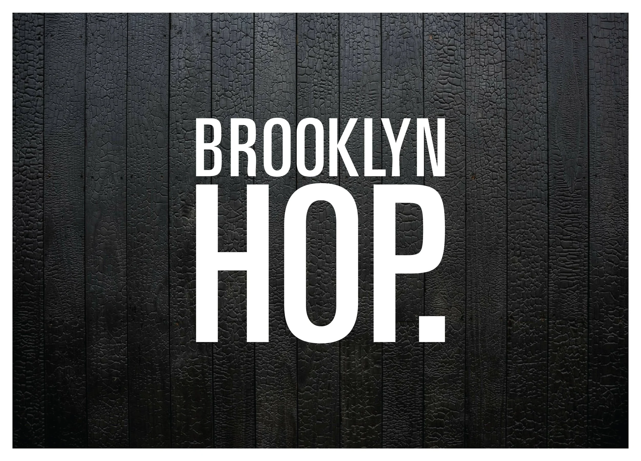 A sign with the words "BROOKLYN HD" printed in large white letters against a black textured wooden background.