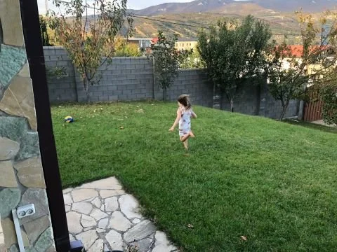 child-running-garden-tbilisi