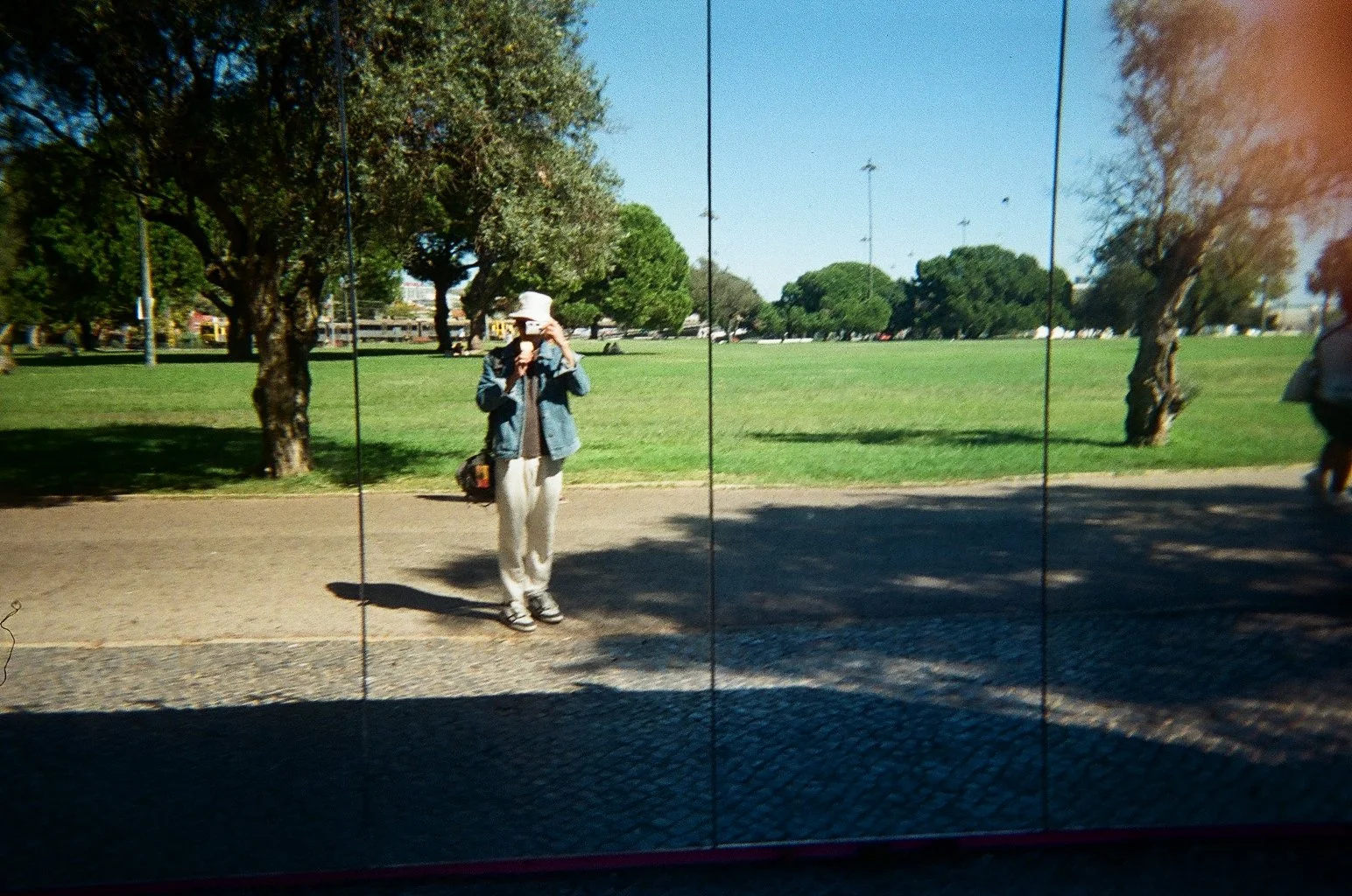 Eduardo Paralizabal Photographer holding a camera during his trip to Lisbon