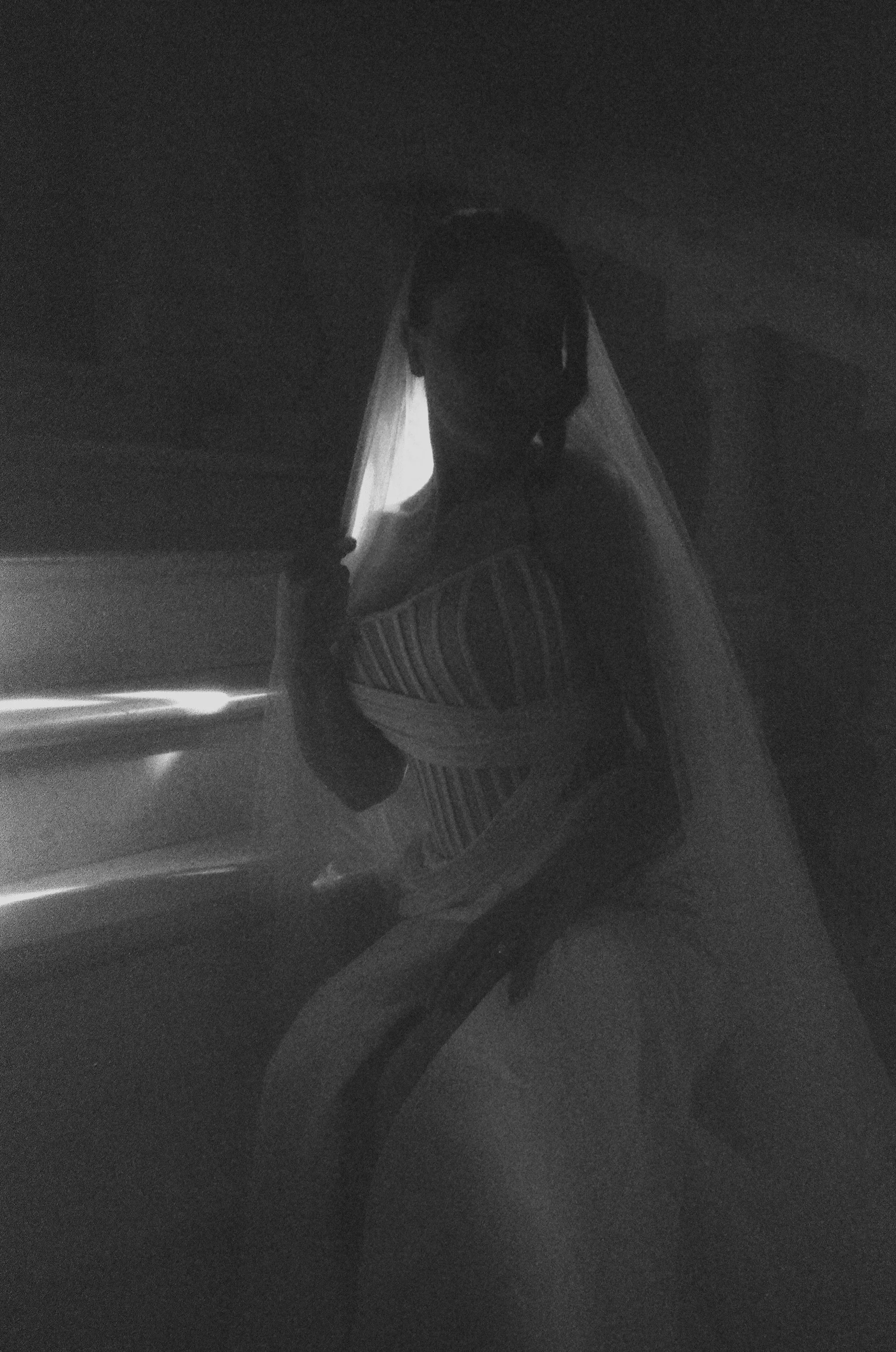 A bride in a moody editorial portrait at Villa la Joya in Mexico wedding.