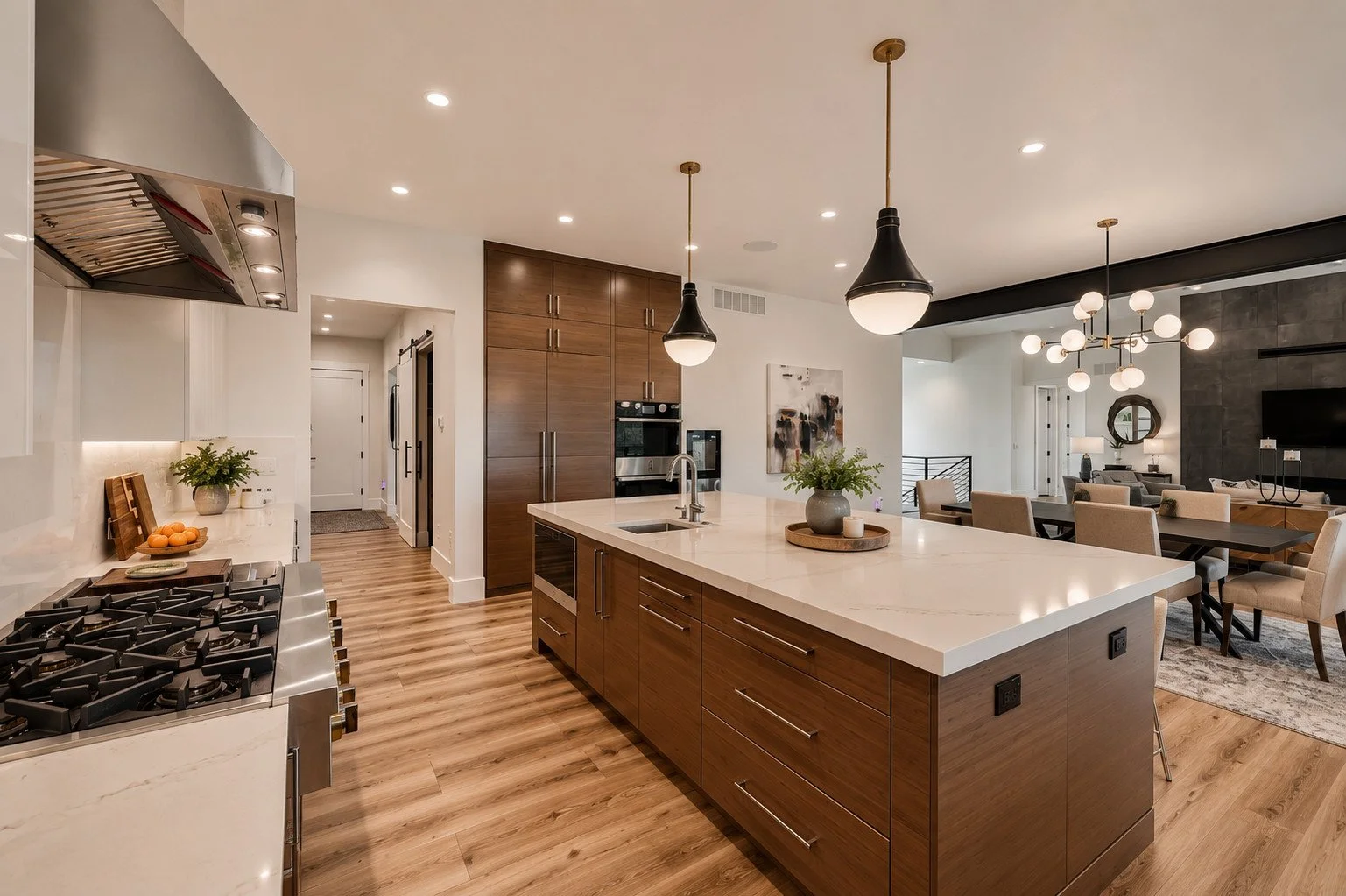 Kitchen with dark accent wall and contemporary lighting, Franktown, Colorado