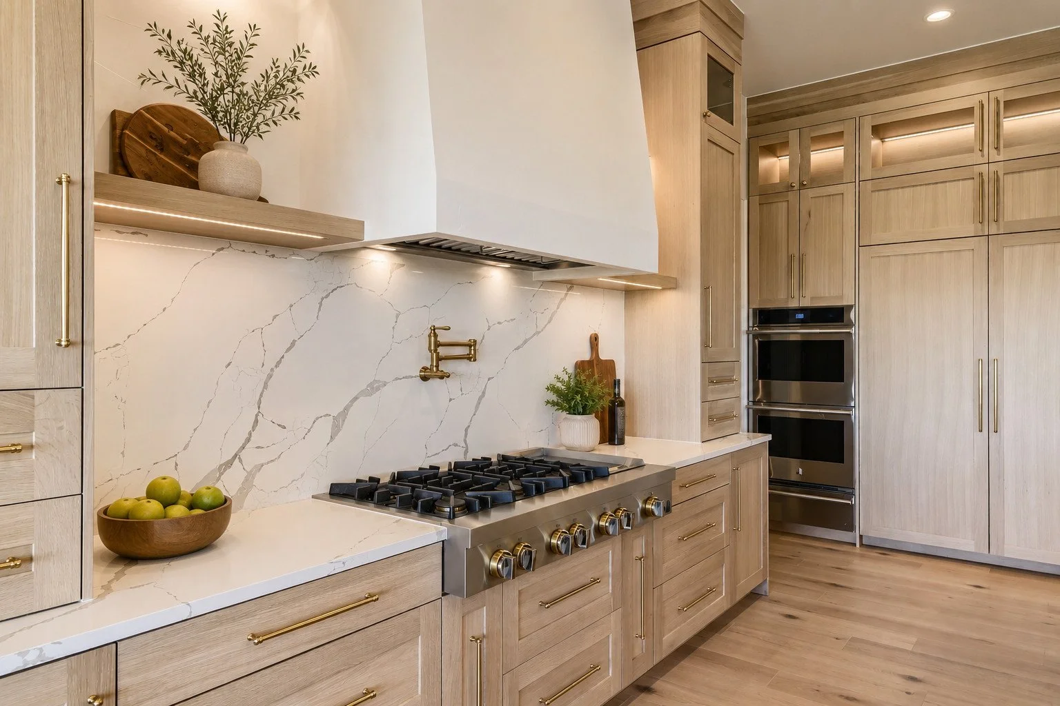 Kitchen with marble backsplash and plaster range shroud, Parker, Colorado