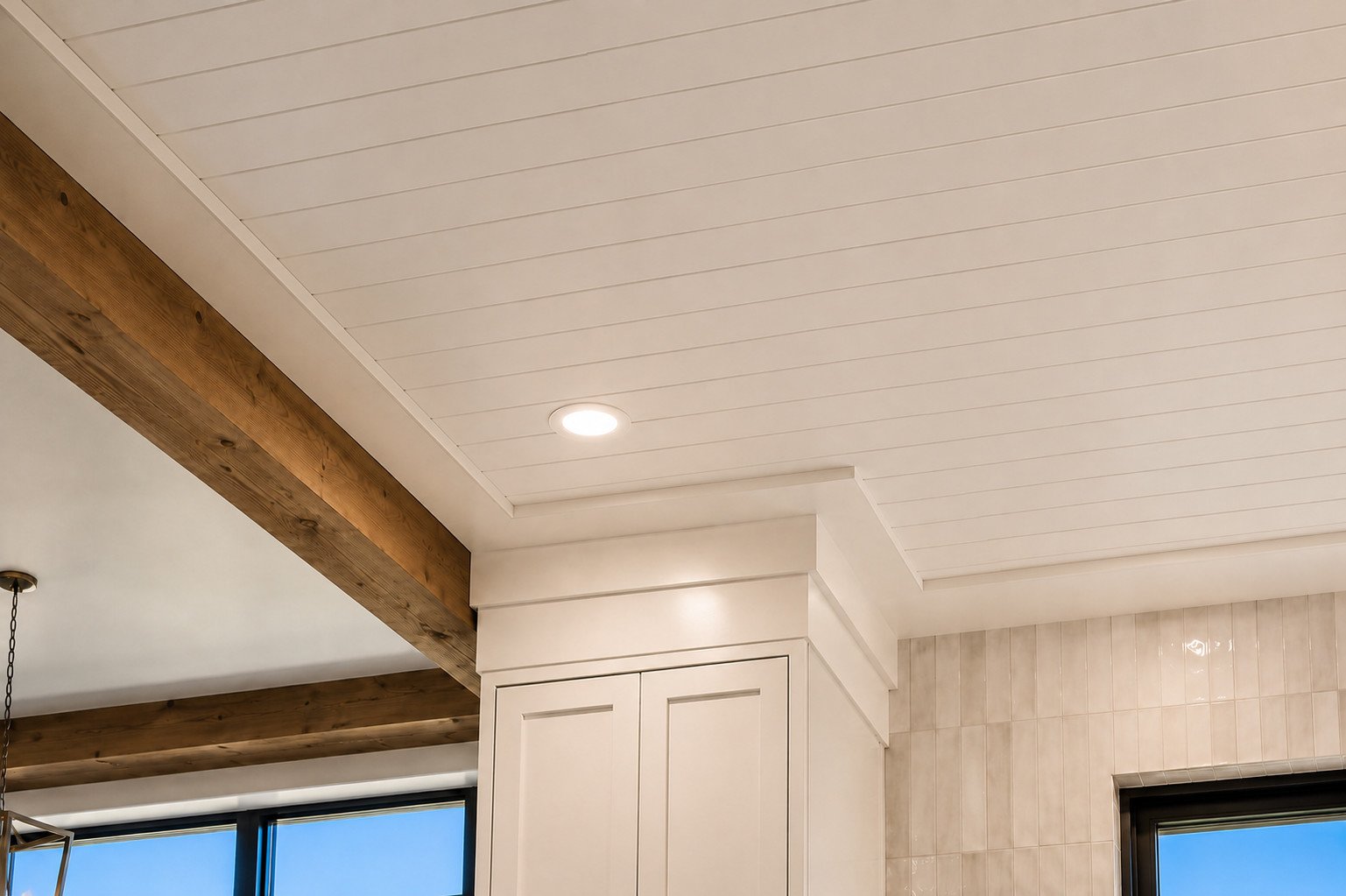 Shiplap ceiling detail with recessed lighting and wood beam, Franktown, Colorado