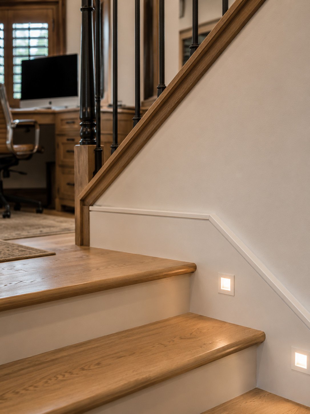 Lighted oak stair treads with white painted riser, Castle Rock, Colorado