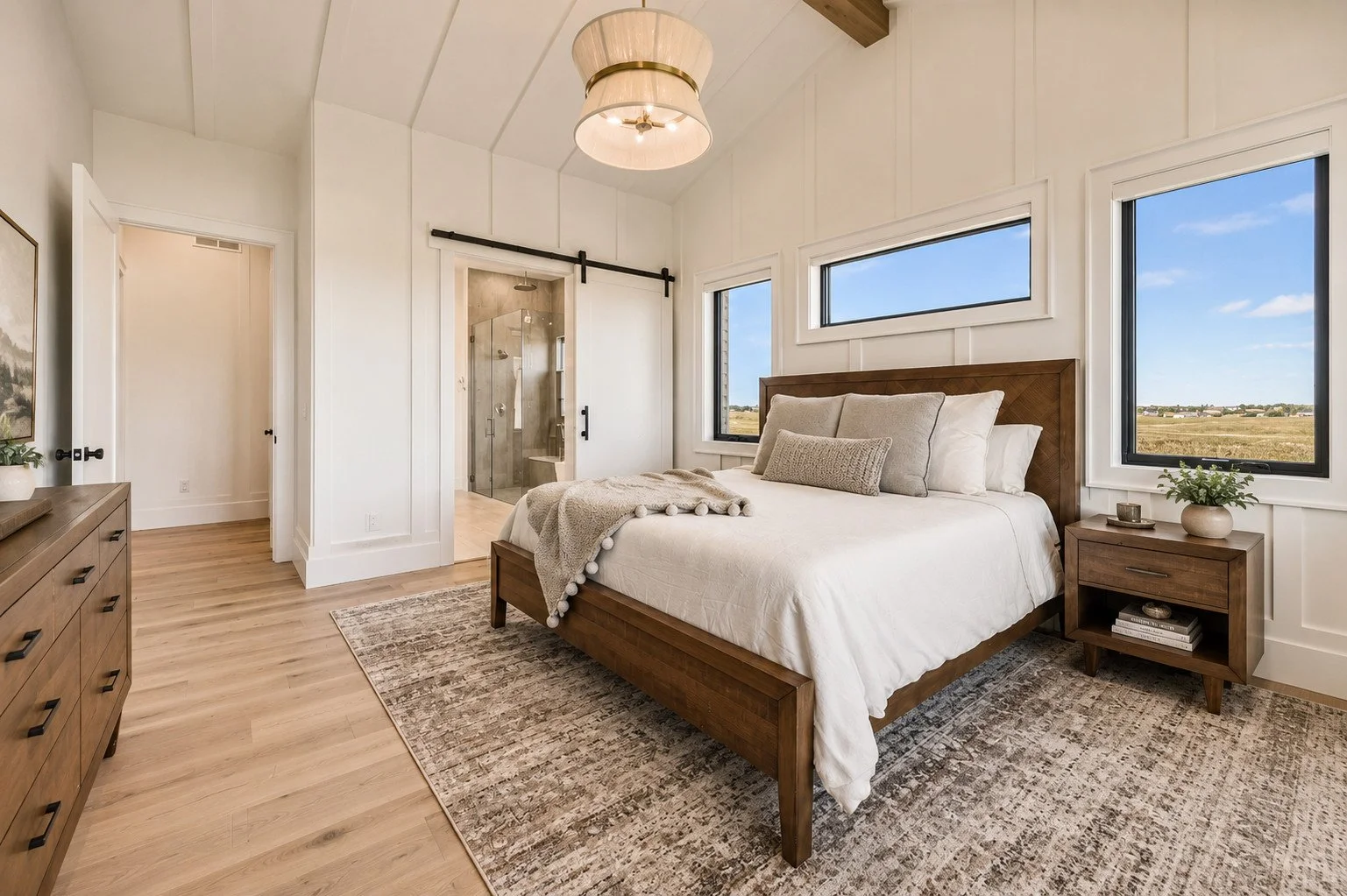 Primary bedroom vaulted ceilings with wood beams and painted trim, Parker, Colorado
