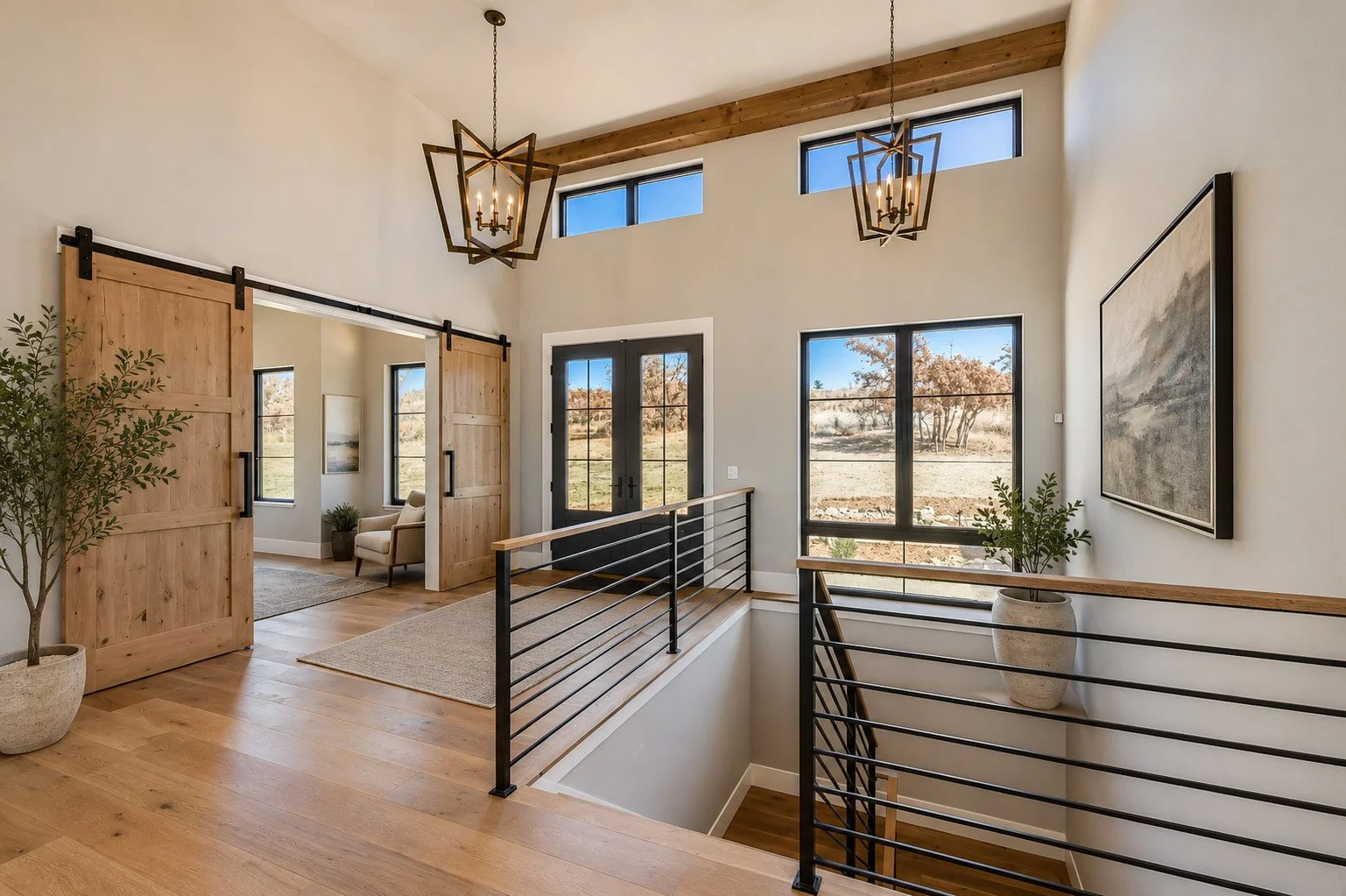 Entryway with sliding barn doors and chandelier, Franktown, Colorado