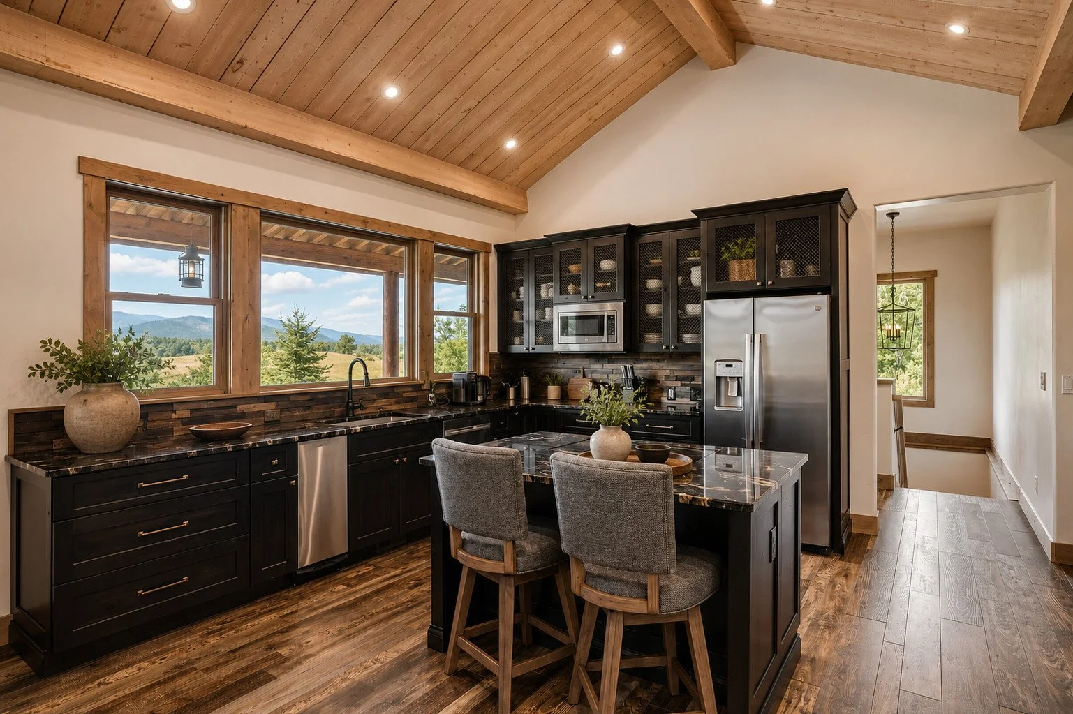 Rustic cabin kitchen with black cabinets and vaulted ceiling, Larkspur, Colorado