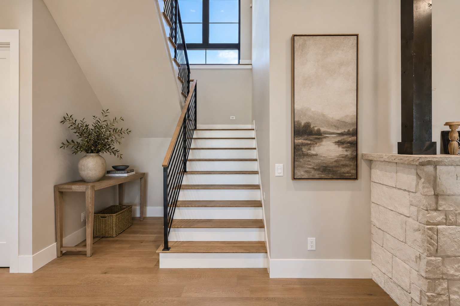 Oak and painted staircase with oak handrail and custom linear railing, Franktown, Colorado