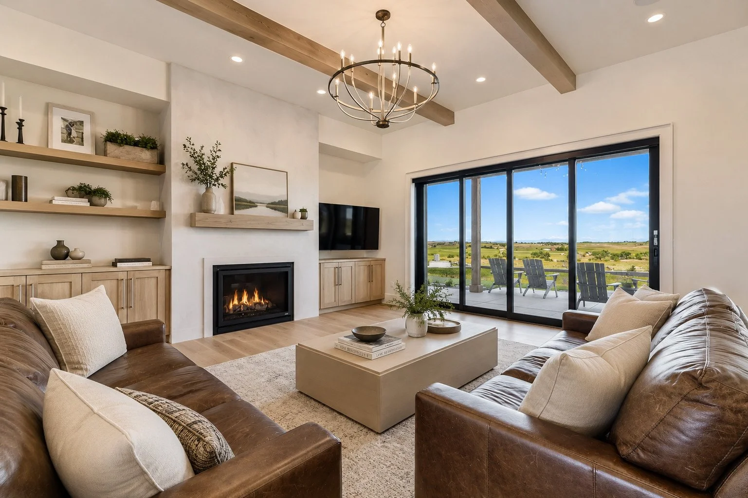 Living room with oak beams, fireplace and sliding glass pocket door to patio, Parker, Colorado